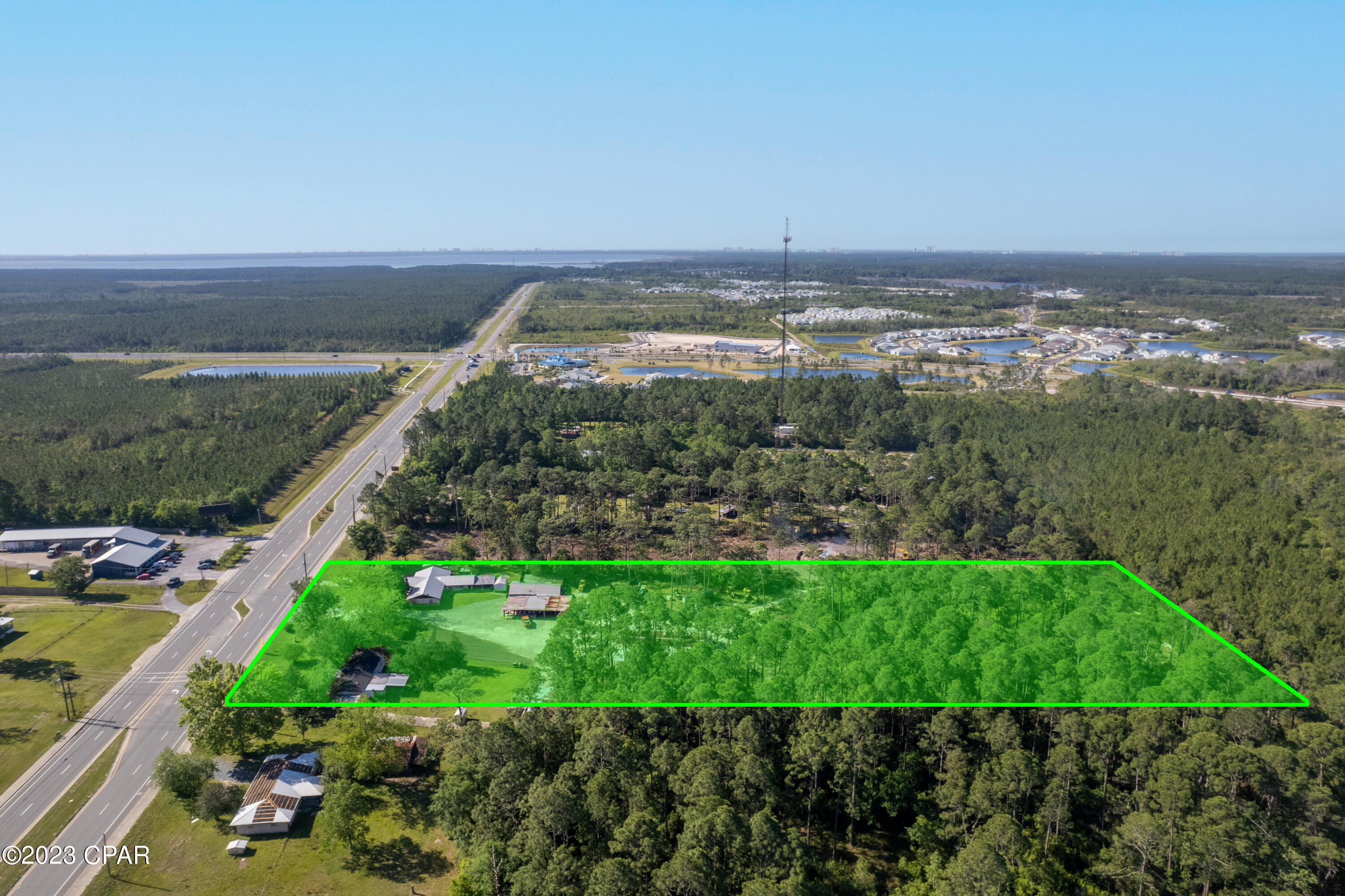 LOCATION is PERFECT and PRIME. It is currently zoned VC (Village Center Sector Plan) which allows for C-1, C-2, C-4, and R-5 use. It is within a few hundred feet from the entrance to the brand new Latitudes Margaritaville which is on track to build 3500 brand new homes. You are within a 10 minute drive to one of the largest attractions here in Panama City Beach, which is Pier Park. Also within a 15 minute drive from the airport (ECP). Confirm all information with Bay County Planning and Zoning.