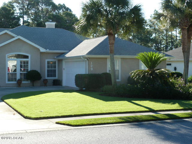 The most popular sub-division on the near West End. Three blocks to the beach, one mile to Pier Park, fifteen minutes to the new International Airport. This almost 2,000 sq ft home offers a split floor plan for entertaining as well as your privacy. The 10' ceilings creates a sense of openness, a stylish decorators ledge allow you the opportunity to add your individual charm. The great room is large and inviting with a corner fireplace and ample wall space for all of your furniture. Enjoy the large open kitchen with loads of cabinets as well as a pantry.  There is a pass through to the great room as well s the dining room. The laundry is conveniently located just off the garage access. The garage is very impressive with loads of cabinets and a new epoxy floor.