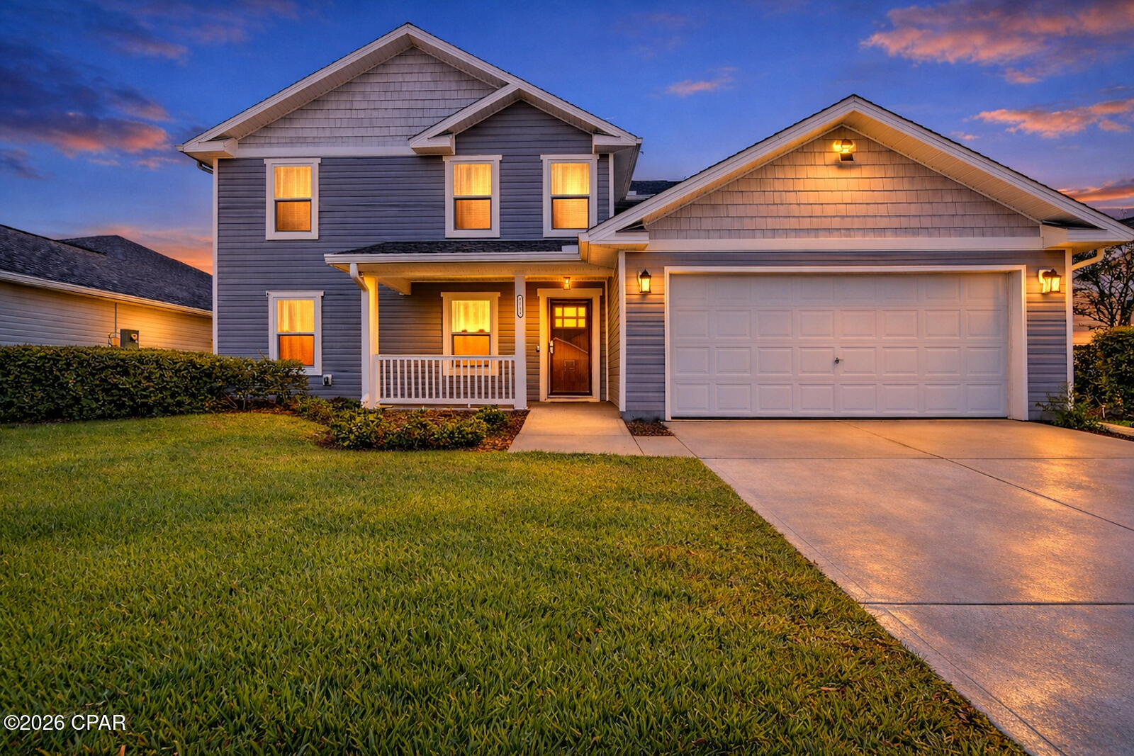 Welcome home to 7312 Port Place, a spacious and modern residence perfectly situated in a tranquil Southport neighborhood. Built in 2017, this impressive two-story home offers an expansive 2,672 square feet of living space, featuring 5 well-appointed bedrooms and 2.5 bathrooms--an ideal setup for a large family or those seeking a private primary suite. The main level is designed for convenience, boasting an open-concept living area, a large dining space, and a chef-friendly kitchen outfitted with beautiful Granite countertops, ample storage, and sparkling Stainless Steel appliances. A key feature is the main-level Owner's Suite, offering a private retreat complete with a spacious walk-in closet and a full en-suite bath with dual vanities. Upstairs, four additional large bedrooms and a full shared bathroom ensure plenty of space for family or guests & a flex space. This home offers the benefits of newer construction (2017) with energy efficiency, an attached two-car garage, and a low-maintenance exterior. The backyard oasis is a dream! It is conveniently located just minutes from [Highway 77/Deerpoint Lake], providing quick commutes to [Panama City/Tyndall AFB], shopping, dining, and excellent local schools. Don't miss this fantastic family home offering maximum space and a superb layout. photos are virtually staged..