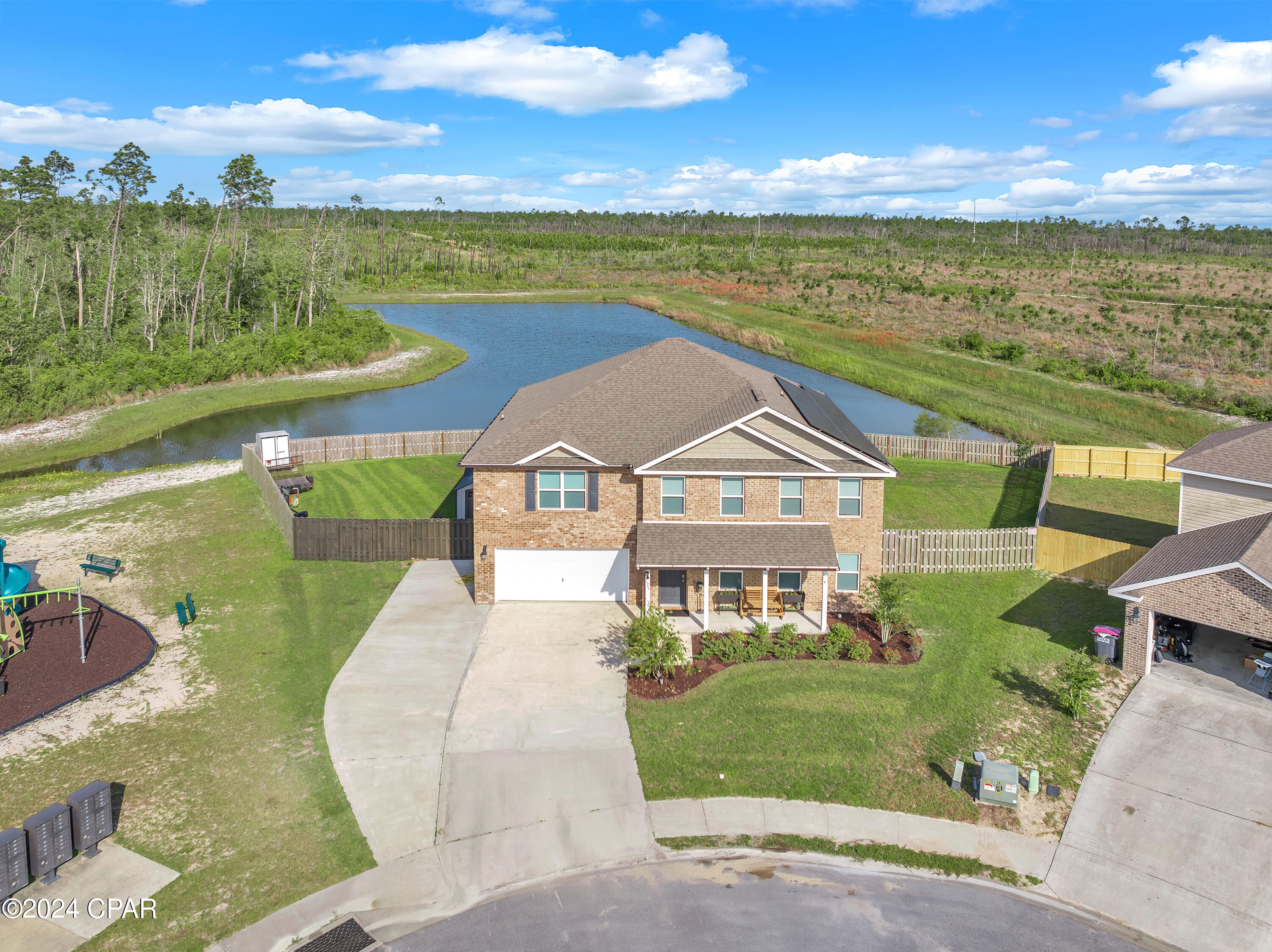 Spacious 5BR/3.5BA home in the family-friendly Manors of Magnolia Hills offering 4,032 sq ft of open-concept living. Main-level primary suite features a walk-in closet, double vanity, separate shower, and soaking tub. Upstairs includes four additional bedrooms, a Jack-and-Jill bath, and an oversized bonus room. Enjoy pond views from the covered back patio or take out the included John boat for a relaxing afternoon on the water. Welcoming foyer, covered front porch, fenced yard, sprinkler system, and large storage shed included.
Energy costs are exceptionally low: fully paid-off solar panels save $200-$300/month, dual HVAC systems with UV air purifiers, and average total utilities of just $150-$200/month. One-year home warranty included. Playground just steps from your front door, 20 minutes to Tyndall AFB, and zoned for Cedar Grove Elementary, Merritt Brown Middle, and Bay High School. Easy access to shopping, dining, and major roadways.
Seller offering $7,500 flooring credit at closing, choose your own style & have installed prior to closing! Property is tenant-occupied; requiring a minimum 30 day close.
Assumable 2.25% VA loan with approximately $303,000 balance at $1,839/month (P&I). Compare to $2,754/month at today's 7% rates, a savings of $915/month and $220,000+ over the life of the loan. Approximately $212,000 down required to assume. VA eligibility required. Don't let this rate walk out the door.
This one truly is a must see!