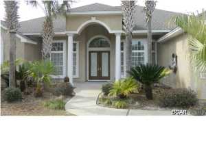 This is not your normal bank foreclosure. Look no further, this Palm Bay exclusive luxury home just hit the market and it won't last long! With 3 bedrooms and 3 full baths this spacious family sized home with a pool and double-car garage is the nicest on the market for this price. Once you step through the front door you are sure to fall in love, as this home has all the makings of a truly elegant and upscale residence. This home offers an open floor plan with panoramic views of the screened pool from the great room, kitchen, master bedroom and possible ''second'' master bedroom. You'll sleep like royalty in the enormous master bedroom with double doors leading straight to the pool and two HUGE walk-in closets. The master bath area features a large garden tub, separate shower area