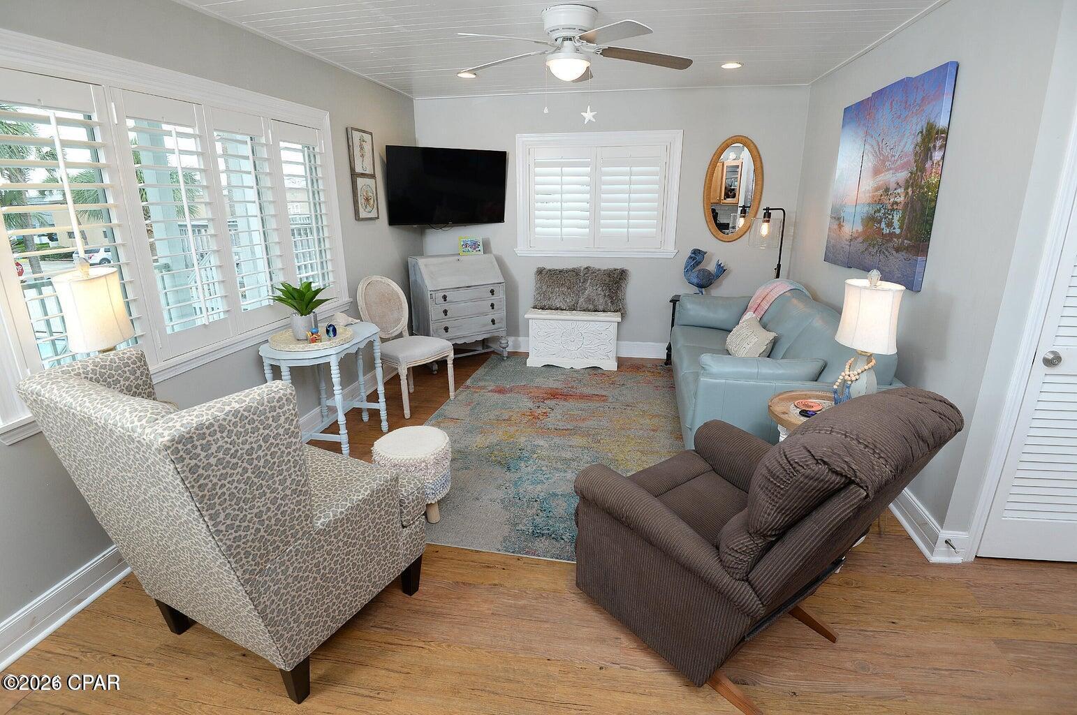 Coming Soon, no showings. Gulf views, beach access, and a fully furnished coastal retreat await! Perfectly positioned directly across the street from the beach and dedicated beach access, this beautifully updated condo offers stunning Gulf views from both the living area and bedroom, allowing you to enjoy the sights and sounds of the water from the comfort of your own unit.

One of the largest floor plans in the complex and ideally located on the side of the building facing the Gulf, this meticulously maintained condo is beautifully decorated and move-in ready. From the moment you walk inside, you'll appreciate the charming shiplap ceilings, luxury vinyl plank flooring, custom wooden shutters, stylish 6-inch baseboards, and upgraded finishes throughout. The full kitchen is equipped with upgraded appliances and offers plenty of space for cooking and entertaining.

The inviting living area is designed for comfort and relaxation, featuring a beautiful leather sleeper sofa, recliner, wingback chair, and additional seating for family and guests. The spacious bedroom offers a large custom closet complete with shelving, drawers, and additional hanging space for exceptional storage.

Step outside and enjoy the community's sparkling swimming pool, expansive sun deck overlooking the Gulf, BBQ grilling area, and the convenience of beach access located directly across from the property. Whether you're searching for a personal beach getaway, second home, or income-producing short-term rental, this property offers incredible versatility.

Located in a desirable low-density building on the sought-after East End of Panama City Beach, you'll enjoy a more relaxed beach atmosphere while remaining just minutes from restaurants, shopping, marinas, and local attractions.

With Gulf views from both rooms, beach access just steps away, beautiful furnishings included, and one of the largest units in the complex, this is an exceptional opportunity at an attractive price point. This unit is expected to generate significant interest, so schedule your showing today.

Low HOA fees of just $1,118 per quarter cover building insurance, water, sewer, trash, exterior maintenance, pest control, pool maintenance, BBQ grilling area, community amenities, and access to the on-site laundry facility. Electric runs about $62 a month and verizon is $45 a month.