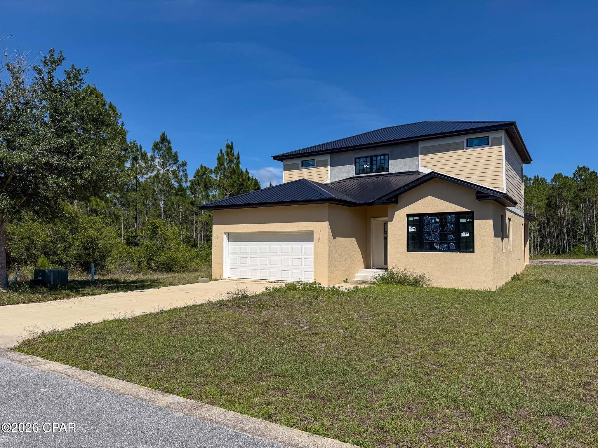 118 Shallow Reed Drive rests in the beautiful and quaint residential community of Shallow Reed where you're just minutes from downtown Port St. Joe and the beaches of Cape San Blas. This home is incomplete and will need completion to receive a CO. This home is offered at a discounted price to reflect the needs required to complete construction. Sold As Is. Buyer's responsible for all due diligence.
