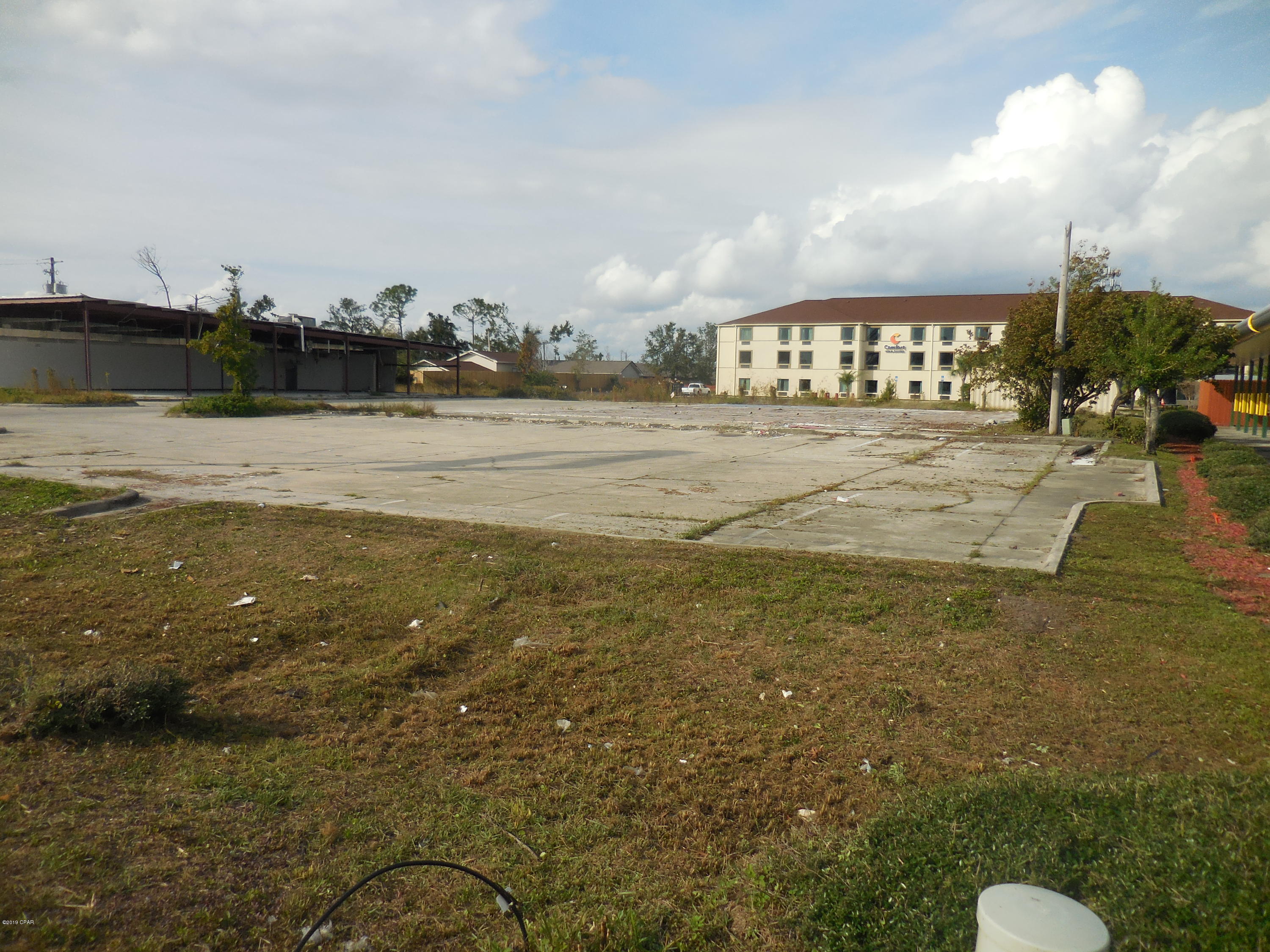 TWO OFFERINGS NOW COMBINED AS ONE AND REDUCED TO SELL! 

High traffic and visibility  'Hard Corner' now available for development. Offering includes all three parcels, with access and frontage on Jenks Ave. and 23rd Streets.

   Former building removed on corner parcel. Existing building on adjacent parcel damaged by Hurricane Michael but not removed. Seller make no representations as to value of remaining structure. 

  All three parcels convey with offering to equal 1.43 acres. Both billboards remain as annual lease contracts to convey with sale. 

   All utilities available to site.

   See additional Agent Remarks.