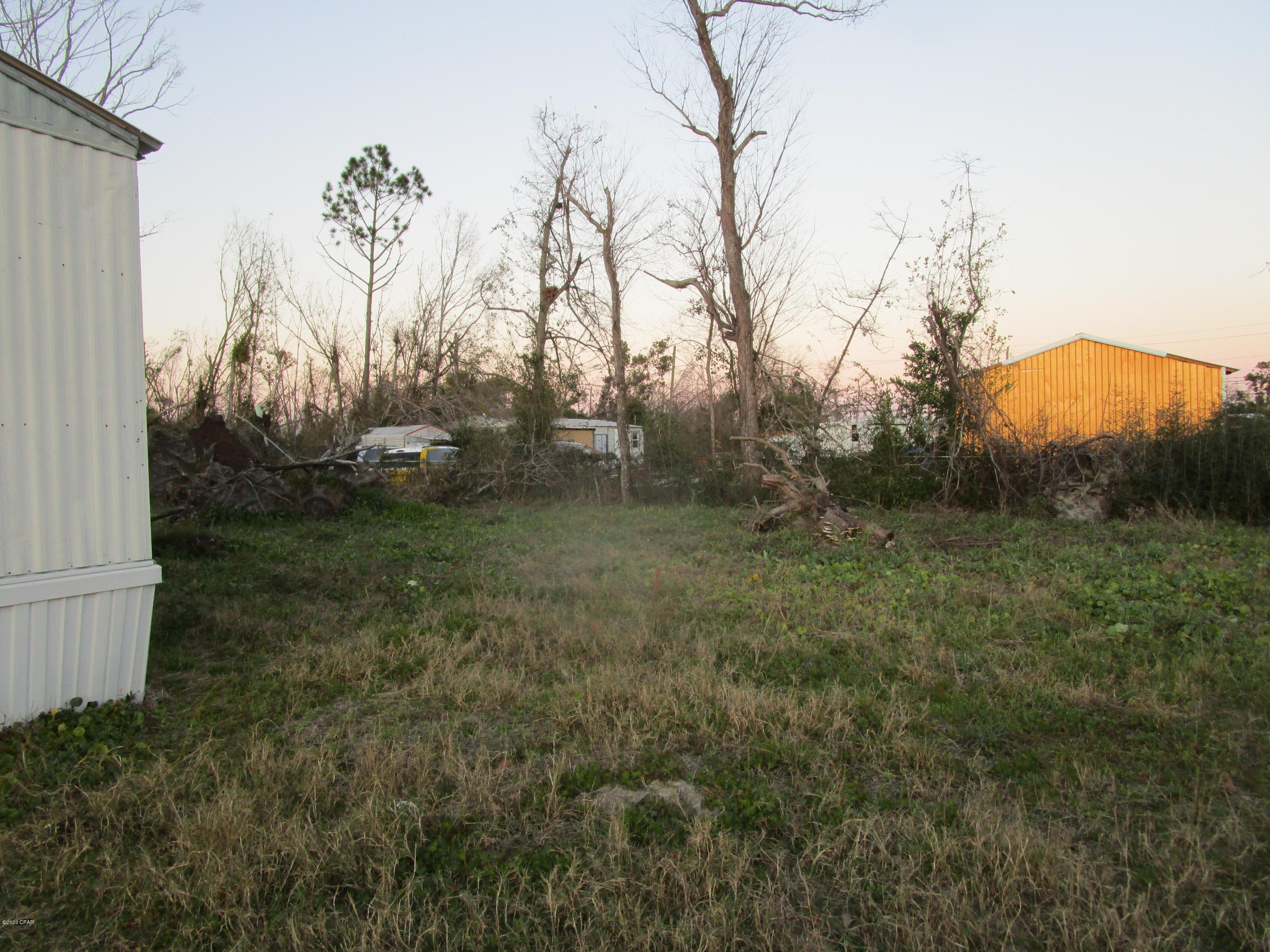 ATTENTION INVESTORS-Priced to Sell!  Don't miss out on this investment opportunity, 2 bedrooms and 1.5 bathrooms mobile home on just over a quarter acre lot. The home could use a little TLC but has great rental potential.