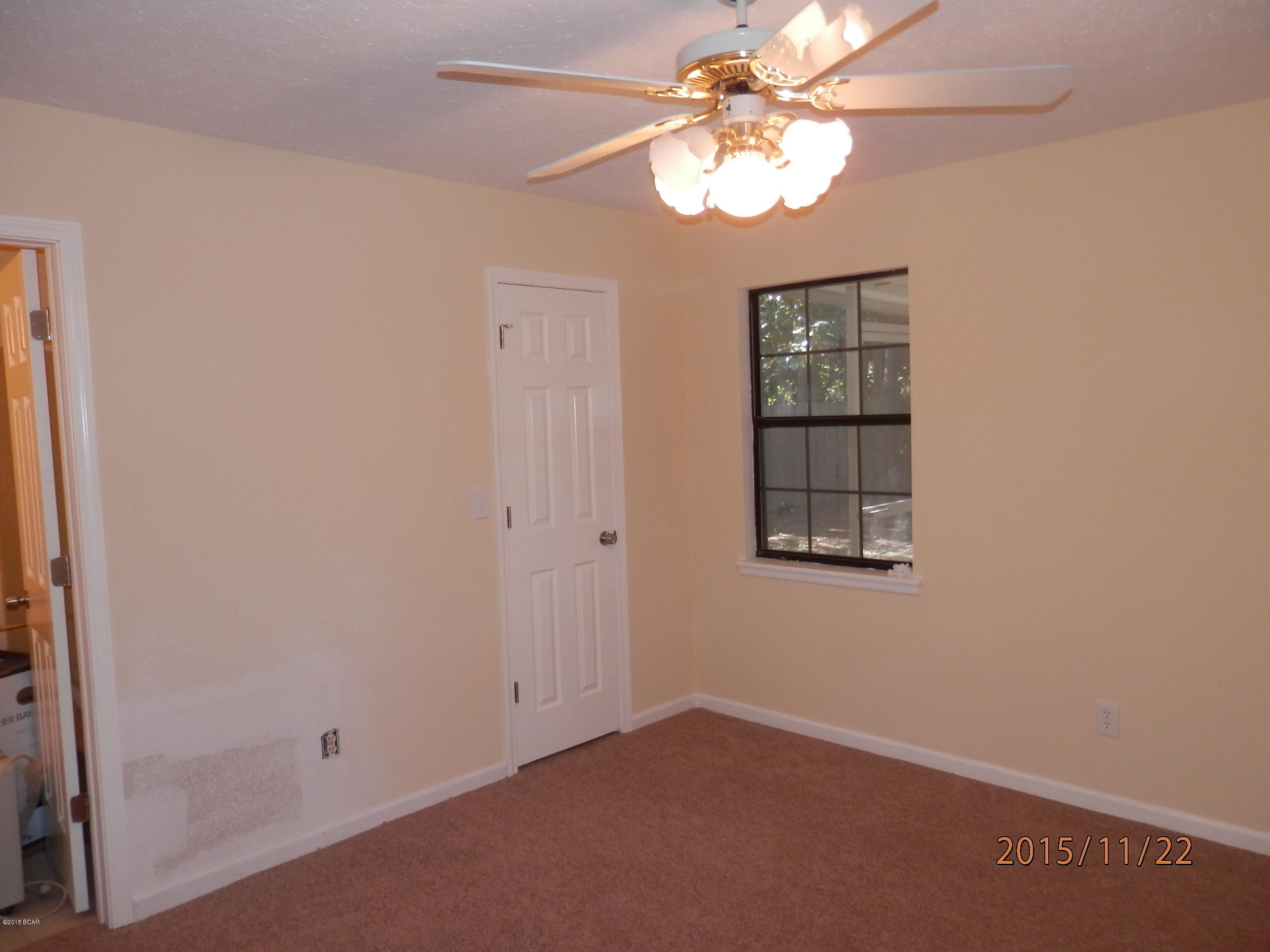 Newly renovated home with interior and exterior paint, Newly remodeled kitchen with new cabinets and counter tops. Tile floors throughout except the bedrooms have new carpet. Fenced yard with yard building and there is a side carport as well as a 1 car garage. Screened porch just off of the living room. Eat in kitchen with dining area and breakfast bar.