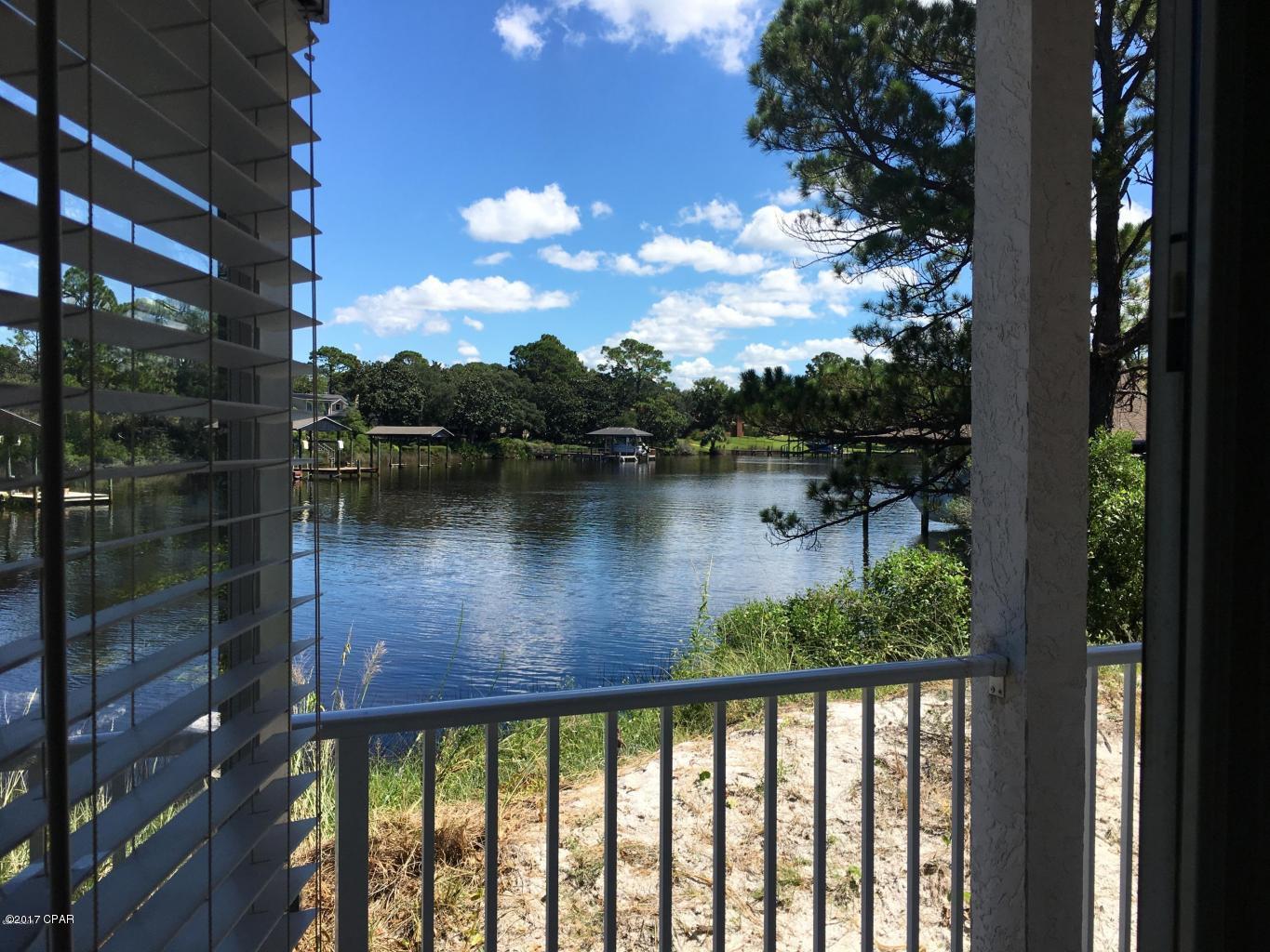 Waterfront living on Grand Lagoon and 1 block from the BEACH. This 1 bedroom, 1.5 bath unit has beautiful waterfront views of Grand Lagoon. Complex features a pool, clubhouse and private covered boat slips with lifts that can be rented through the home owner's association. Unit is located on the first floor so no worry about climbing stairs over and over again with groceries. Bonita Point is centrally located in Panama City Beach. This unit is managed by Seltzer Real Estate, please call office 850-235-0578 to schedule a showing! Tenant is only responsible for electricity, cable and internet. Water and trash are provided. Disclosure: No Pets!