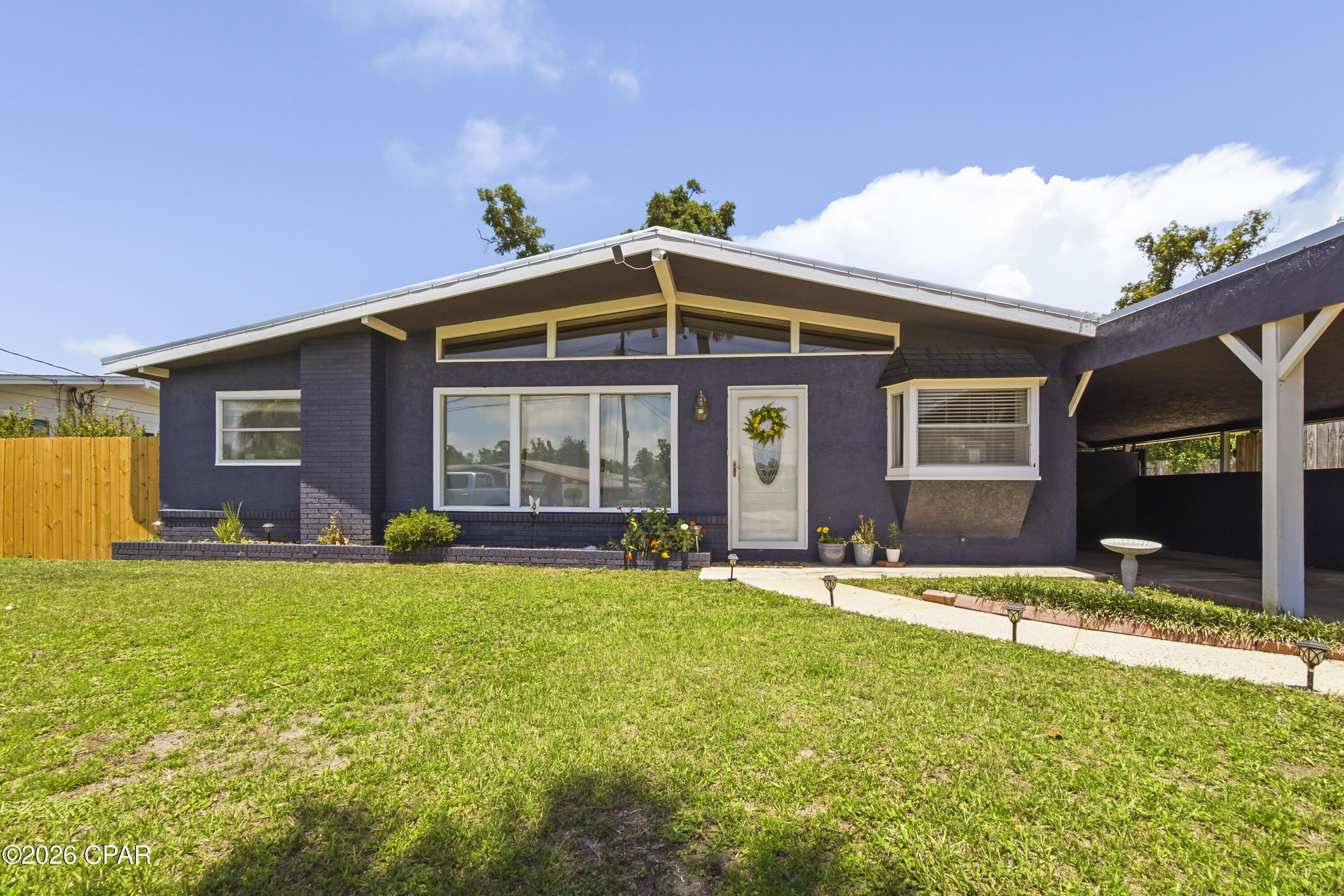 NOTE: The two bonus rooms and laundry room are not included in square footage.
Spacious ranch style home, with tons of natural lighting, located in quiet St. Andrews neighborhood walking distance to St. Andrews bay. This home is centrally located between St Andrews area and downtown Panama City and only a 5 min drive to both! Wonderfully updated with 2019 metal roof, newer kitchen cabinets, granite countertops, stainless steel applicances, paint and flooring throughout, and updated bathrooms as well. Another nice addition was the mini AC splitter system that helps keep the home cooled/heated more efficiently while providing lower power costs. Large Master bedroom with bonus room that could be used as an office or walk-in closet. A Tankless hot water heater was also installed to help with the efficientcy of the home. Another bonus room adjacent to the dining room could be used a nice sitting area or office. Large screened in porch that leads to very spacious backyard with massive storage/work shed and shaded Pergula. The circular drive way and additional parking is great for families or large gatherings. Home was well cared for and it shows!