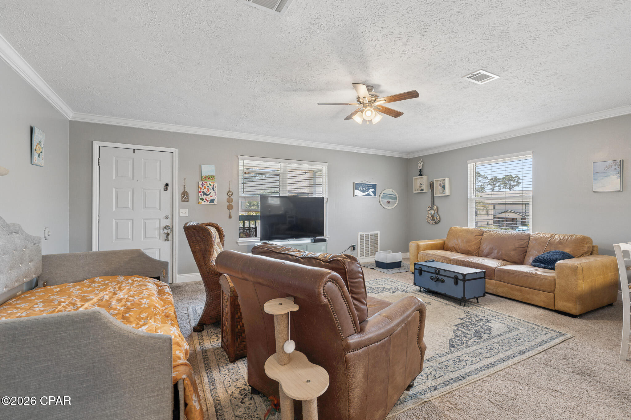 COMING SOON-NO SHOWINGS   Welcome to this absolutely adorable, recently updated 2-bedroom, 1-bath condo offering 720 square feet of comfortable, easy living in one of Panama City Beach's most beloved waterfront communities. Step inside to a bright, open living area that flows effortlessly into two generously sized bedrooms, complete with the everyday convenience of an inside laundry area and a dedicated outside storage room for all your beach gear and extras. Perched on the second floor, you'll enjoy added privacy and peace and quiet with no neighbors overhead.
Tucked along the scenic Grand Lagoon--a favorite local hub for fishing, boating, paddleboarding, and kayaking--Greenwood Estates is a quiet, low-traffic complex cherished for its laid-back, tranquil setting. Community amenities include a sparkling pool, a gated dock, and a covered picnic and grilling pavilion, the perfect spot to relax, entertain, or watch the boats glide by. The location is hard to beat: you're just about five minutes from sugar-white sand beaches, plus marinas, shopping, and some of the area's best dining right on North Lagoon Drive, including The Grand Marlin, Capt. Anderson's, and the beachfront favorite Schooners.
Whether you're searching for a full-time coastal home, a relaxed seasonal retreat, or a long-term residence near the water, this move-in-ready charmer delivers character, comfort, and an unbeatable lifestyle. Please note: this is an owner-occupant and long-term community--no short-term/vacation rentals. Homes like this in Greenwood Estates don't last long, so call today to schedule your private showing!
