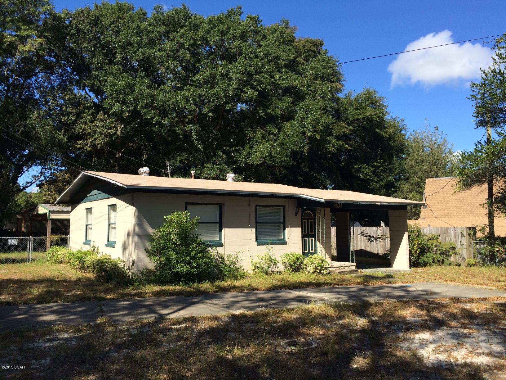 Florida cottage located in the Springfield area.  Home features laminate wood floors, new appliances, covered carport.  There is also a large wired shed with covered car port for 2.