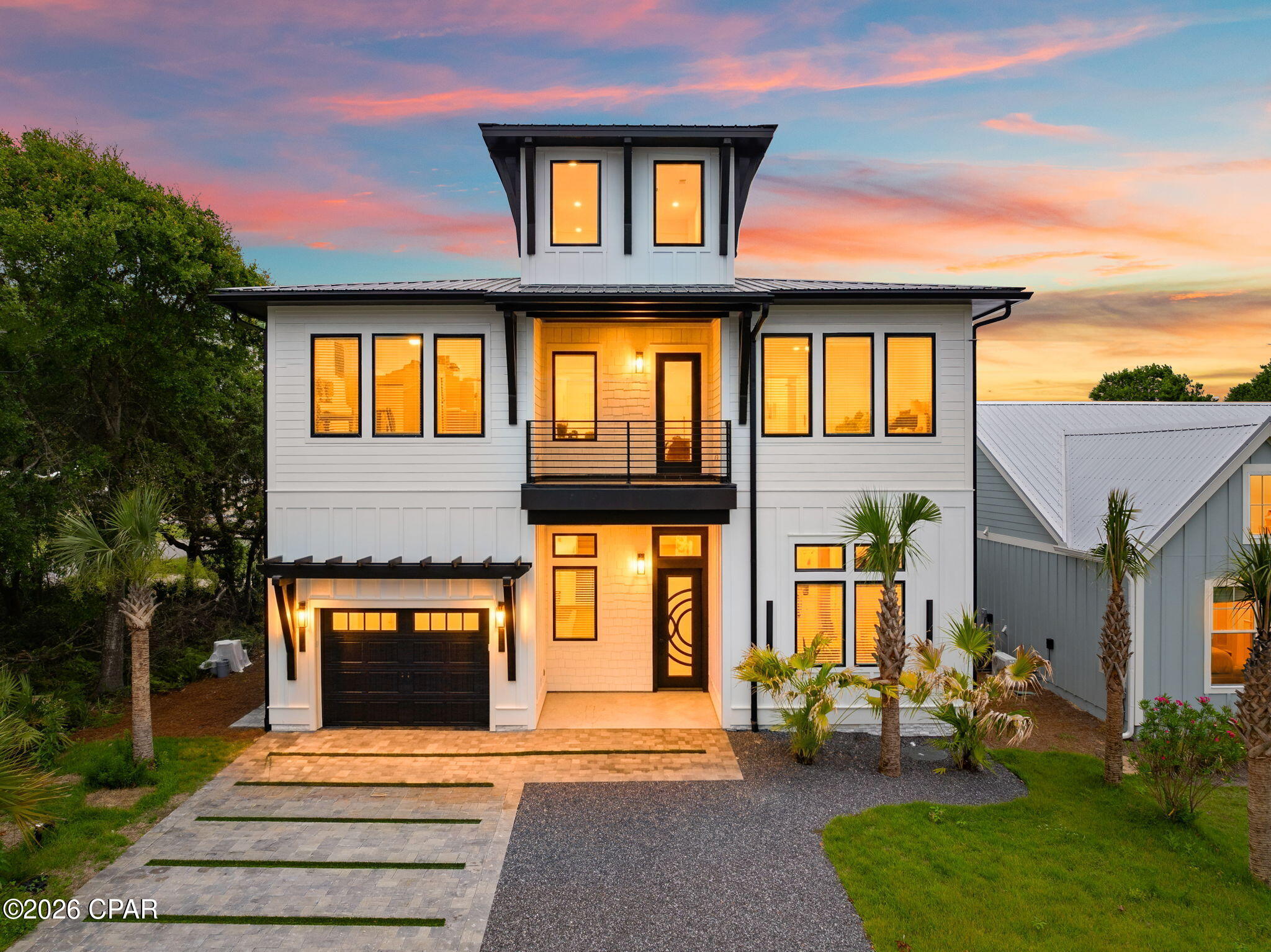 Luxury new construction in Laguna Beach Estates on the highly desirable West End of Panama City Beach! Located near the 30A corridor and just minutes from the beautiful beaches, dining, shopping, and entertainment PCB has to offer, 240 Oleander Drive is a standout opportunity for investors, second-home buyers, and luxury coastal buyers.

Built in 2026, this 5-bedroom, 4 full bath and 1 half bath home offers approximately 4,173 sq ft H&C and is designed with short-term rental performance in mind. No HOA.Short-term rentals allowed. The spacious layout, private pool, outdoor kitchen, wet bars, and luxury finishes create an ideal setup for vacation rental guests and large groups.

Interior features include marble flooring throughout, crown molding, recessed lighting, walk-in laundry room, remote-controlled ceiling fans, double-pane low-E windows, energy-efficient insulation, central HVAC on each floor, two 50-gallon water heaters, and a mini-split system in the garage.

The kitchen features Cristalo quartz countertops, a Black Lava quartz island, undermount sink, and upgraded full-overlay white oak cabinetry with soft-close concealed hinges, full-extension soft-close drawer glides, plywood box construction, natural birch interiors, and PPG stain finish. Wet bars with wine coolers are located on both the first and second floors.

Outdoor features include a custom brushed copper iron door, fully paved driveway, landscaped backyard, inground saltwater pool, outdoor kitchen with Black Pearl granite, outdoor shower, sprinkler system with separate irrigation meter, keyless side entry, and low-risk Flood Zone X. One-year builder warranty included.