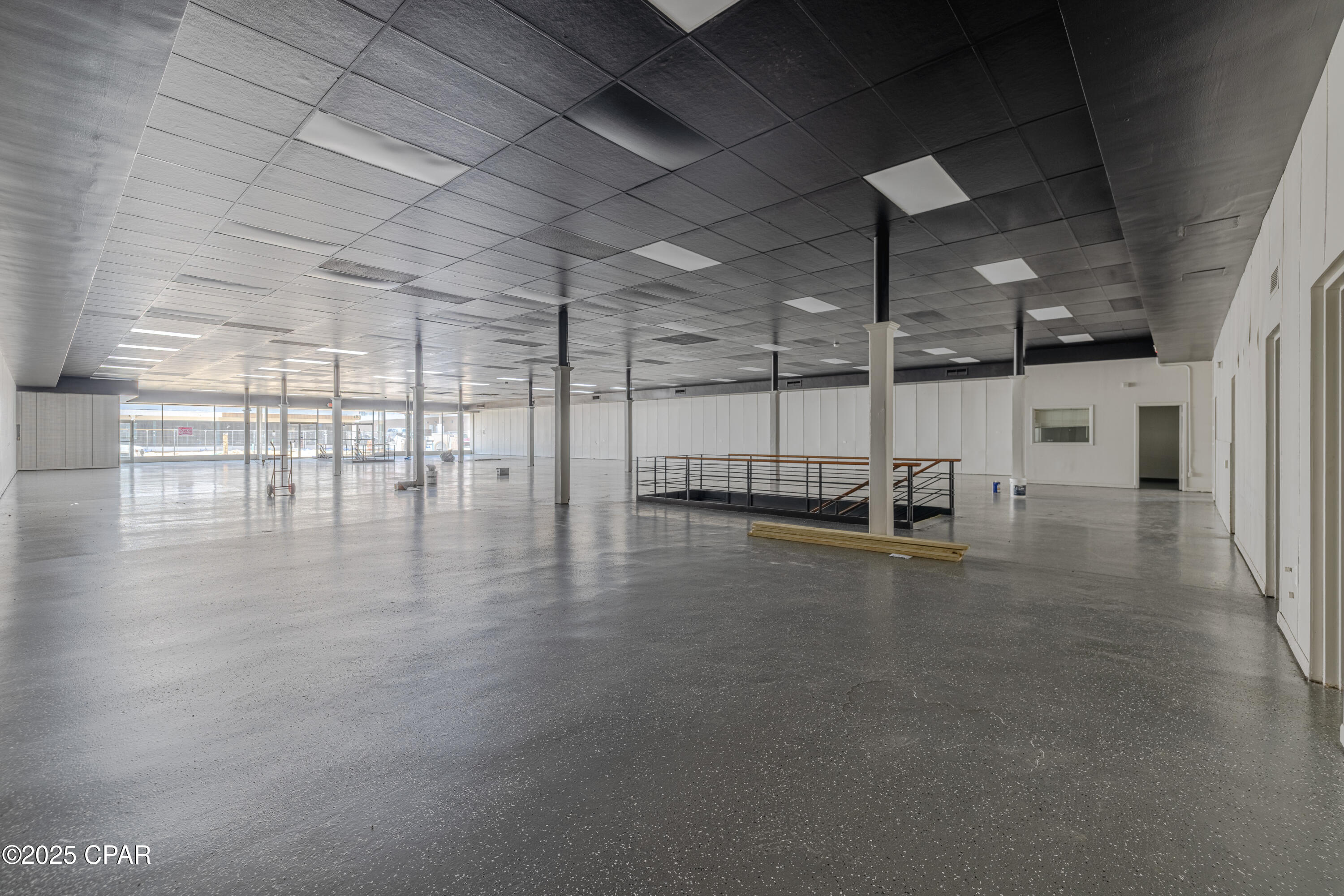 This solidly constructed, three-level commercial building offers a versatile open floor plan suitable for a variety of uses. The building is approximately 30,000 Sq Ft. It features two convenient entrances to the main floor--one with direct access from Harrison Avenue and the other is the alley way from Grace Avenue--providing flexibility for both customer and operational flow. There is also an additional front entrance on Harrison Avenue that goes to the stairway to go to the top floor, this would be great for multi business use. Public parking is readily available along Harrison Avenue, with additional public parking spaces located at the rear of the building, as well as a public parking lot at the end of Harrison Avenue and Old Business 98. The property is also equipped with a freight elevator.. This building is full of potential, schedule your showing today to own a building in Downtown Panama City.