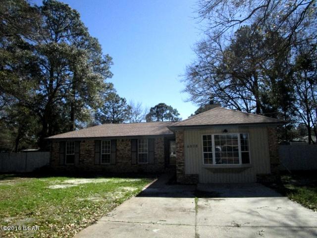 COMPLETELY REMODELED HOME WITH AN IN-GROUND POOL NEAR TYNDALL AFB!  This four-bedroom home features a kitchen with granite counters, new stainless steel appliances that include a gas stove, freshly-painted cabinets and a wine rack; hardwood floors throughout the kitchen and spacious living/dining areas; living room with a tile-accented fireplace; a Master bath with double vanity and tiled shower; loads of closet space in every bedroom AND a brand new roof!  Outside you will enjoy the sparkling pool, and the shed with power is perfect for additional storage.  The home is a MUST SEE in this price range!