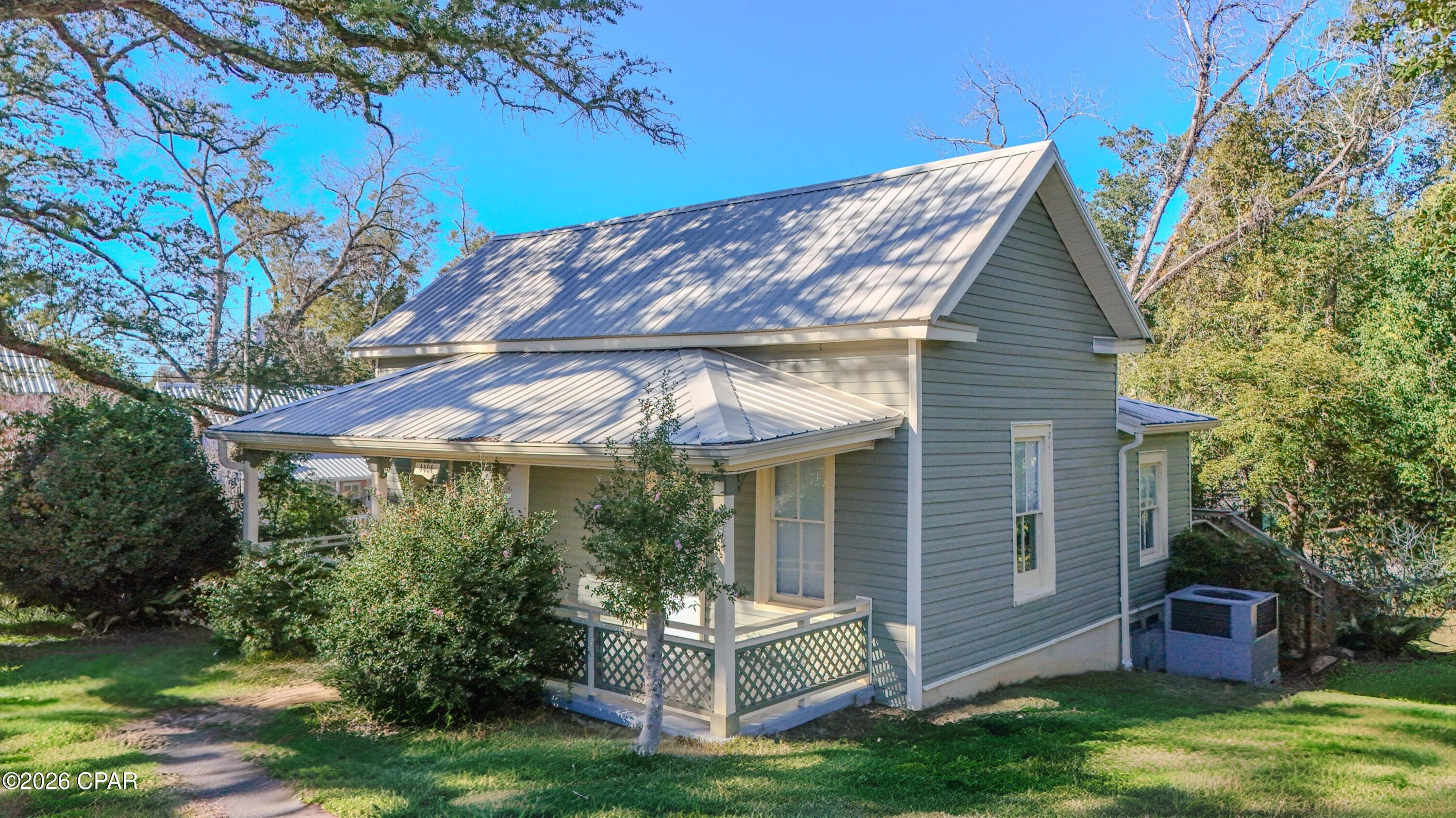 Brand new outside Ac Compressor Unit! Welcome home to 4404 Broad Street. This historic 1910-built home has all the charm and character you would expect, with all the modern features you hope for. This updated home has two spacious rooms as well as an office. The metal roof and vinyl plank flooring are just a few of the upgrades. Extra storage throughout the home adds even more value. This home needs to be seen in person to truly appreciate it. The location is near downtown Marianna, only a few minutes' drive away. It is less than 3.5 miles to Florida Caverns State Park, which is still a local and tourist favorite alike. Another great location, less than 5 miles away, is Jackson Blue Springs. The possibilities are endless when you live so close to all the amazing outdoor life. Take advantage of this home at an amazing price. Reach out to your favorite realtor for a tour today!!!