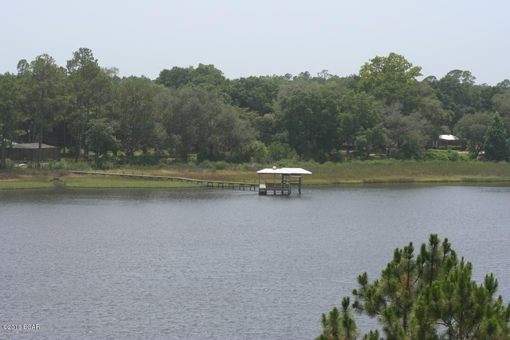 This is Parcel B We have a survey and a riparian survey showing your water rights out into the water for docking permit purposes availability.
Directly overlooking Intercoastal Waterway and across from the new Margaritaville Latitudes Development. There are Plans for a Marina and waterfront restaurant across the Intercoastal.  Premier spot for a nice waterfront home or a high-end townhome. With lots of pretty waterfront frontage. This lot is towards the end of the road for lots of privacy. Parcel Id # 32543-085-000 is the other lot.