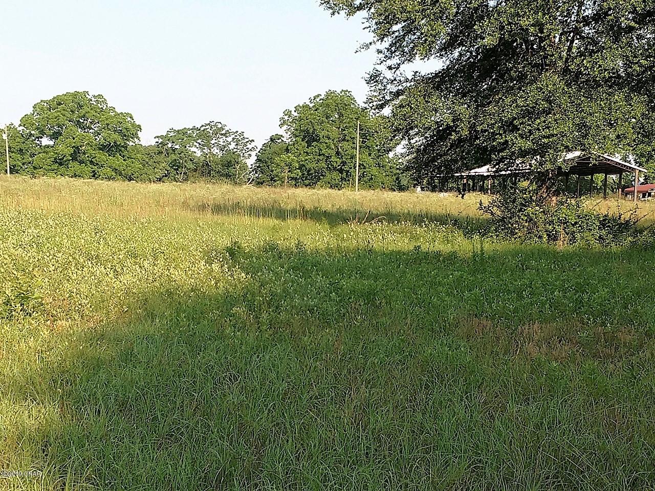 This property would be a great place for your dream home!  There is already a pole barn waiting for you.  There is road frontrage on both Highway 77, as DAMASCUS CHURCH RD.