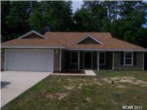 This 3 bedroom/2bath home is located off Resota Beach Road in Southport. Features include open floor plan, security system, tray ceilings, stainless steel appliances, custom cabinets in the kitchen, large laundry area, garage and split bedrooms. This property sits on an oversized lot.