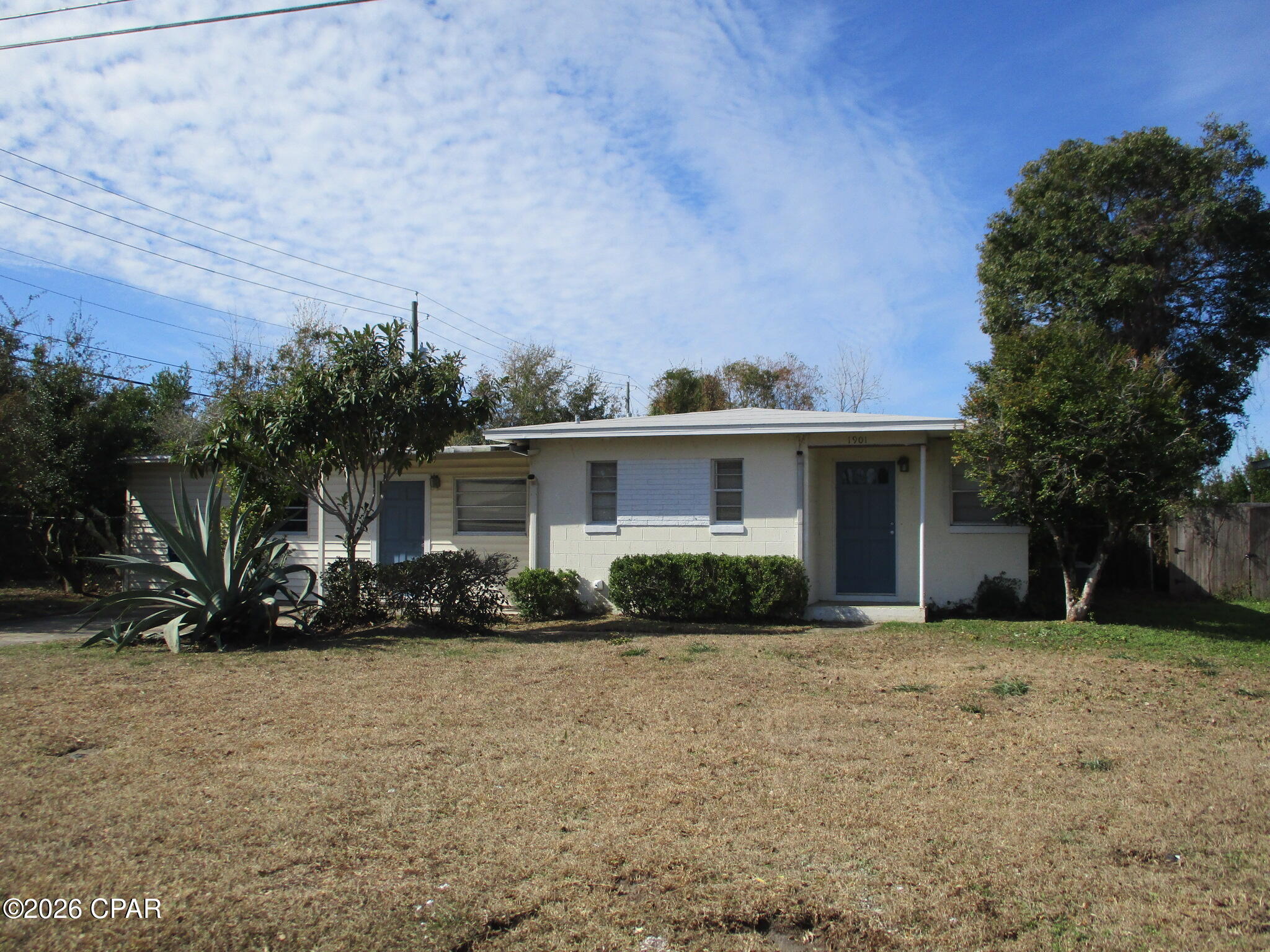 Large cozy 3br/1ba ranch style block home on a 1/4 acre corner lot in Panama City! Lots of room inside and out with 3 large living areas and a huge fenced back yard. Home is centrally located, close to schools, shopping, a lovely upgraded park and playground almost next door, and home is also not too far from the most beautiful beaches in the world!
Home is solid with lots of interior upgrade potential for the kitchen, bedrooms and the living areas. New roof and A/C in 2019 even though home was minimally affected by Hurricane Michael. Seller will consider a flooring allowance. There is a large workshop and sheds in the back yard, all with electric service and gated access through gates from 19th Street. Great place for pets too! 
Excellent home to make your own, and priced to sell...!