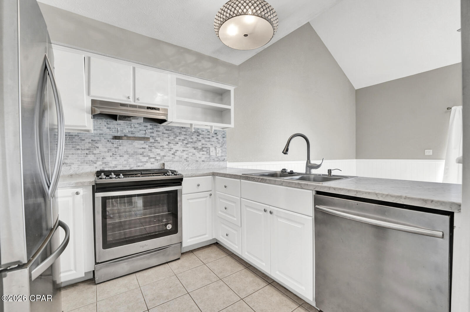 Welcome to this beautifully updated patio townhome in the charming Hickory Park community. This inviting home features durable vinyl plank flooring throughout the living area and bedrooms, creating a modern and cohesive feel.  The spacious primary bedroom and second bedroom are both conveniently located on the first floor. The primary suite includes a private vanity connected to the main bathroom, along with a laundry closet equipped with a full-size washer and dryer.  The updated kitchen showcases a pantry, stainless steel appliances, and a stylish tile mosaic backsplash. It opens seamlessly to the main living area, perfect for everyday living and entertaining. Two sliding glass doors provide abundant natural light and lead to the covered patio—ideal for relaxing or outdoor dining. Upstairs, a bonus loft offers additional flexible living space and includes two storage closets. This area can easily serve as a home office, exercise room, game room, or even a third bedroom. Just beyond the patio, enjoy access to a large courtyard and the community pool, adding to the appeal of this low-maintenance lifestyle.
This would make a great opportunity for a starter home or rental property investment!

This home is conveniently located within 10 minutes of Tyndall Air Force Base and close to shopping, schools, parks, restaurants, and much more! This townhome offers comfort, functionality, and an excellent location.