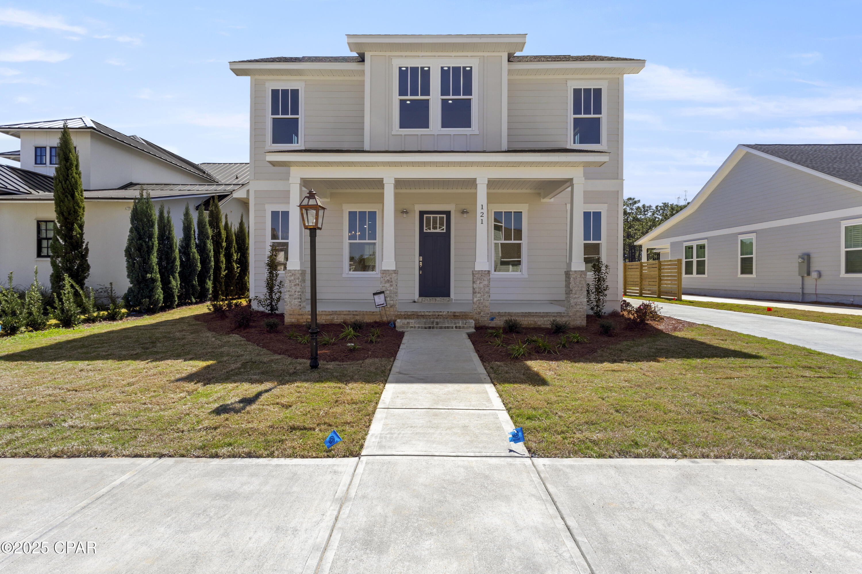 Price Reduced!  Walk/golf cart to the Gulf!  NEW CONSTRUCTION offered in Tapestry Park Phase III in Panama City Beach built by Southern Coastal Homes-2 blocks to the beaches of the Gulf of Mexico and beach access #43, close to shopping and dining, and the famous Pier Park. Homeowners have access to two community pools, lighted sidewalks and green spaces as well as access to tennis courts, basketball courts, and club house. This 4/2.5 CYPRESS floorplan is a brand new Southern Contemporary design with old Florida charm and coveted new technology and upgrades. INTERIOR large volume Great Room with an open floor plan, kitchen with center island and vaulted ceiling, custom cabinetry, walk-in pantry, pot filler and stainless steel appliances.
The FIRST FLOOR Master Suite has a beautiful tray ceiling, expansive tiled shower, double vanity and his and her walk-in closets with direct access to laundry room. The second floor holds 3 well-appointed bedrooms ample storage space. EXTERIOR features of this home include Hardie siding with beautiful brick, 8 ft doors, rear detached garage with covered grilling porch. Home includes smart lock, tankless gas water heater, energy efficient appliances, dual A/C units and has been expertly designed by our design team.