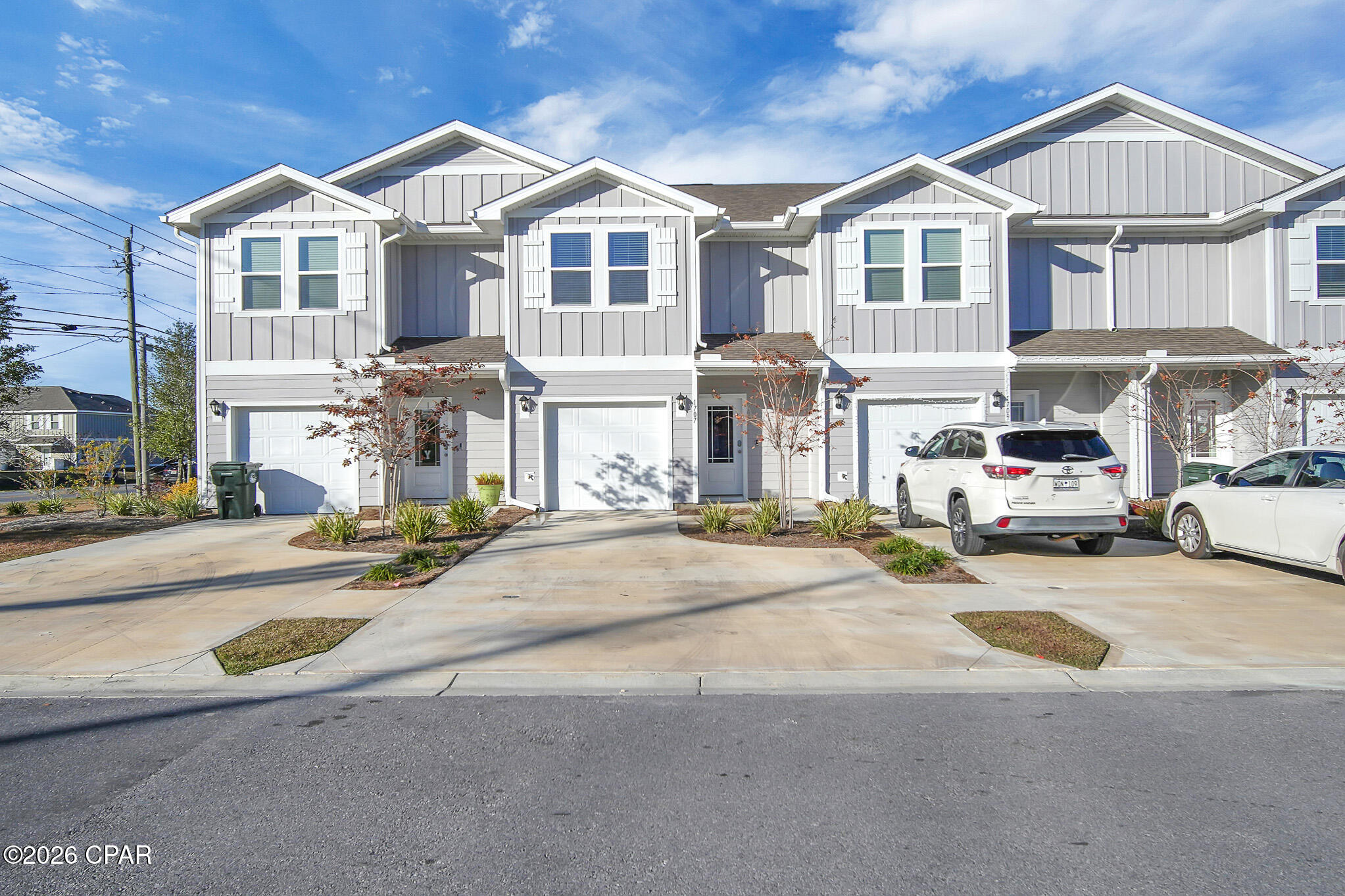 Welcome to 1707 Jakes Drive, a modern 3-bedroom, 2.5-bath townhome located in the newly developed Jake's Landing community in Panama City. Built in 2023, this home features an open-concept layout with stylish finishes throughout, including granite countertops, stainless steel appliances, luxury vinyl plank flooring, and abundant natural light. The spacious kitchen and living area create the perfect setup for both everyday living and entertaining, and the home includes an in-unit washer and dryer for added convenience.

Upstairs, the primary suite offers a private retreat with an attached bath and generous closet space, while two additional bedrooms provide flexibility for guests, family, or a home office. Included lawn maintenance makes for easy, low-maintenance living, and the property is conveniently located near shopping, dining, schools, and Tyndall Air Force Base.
