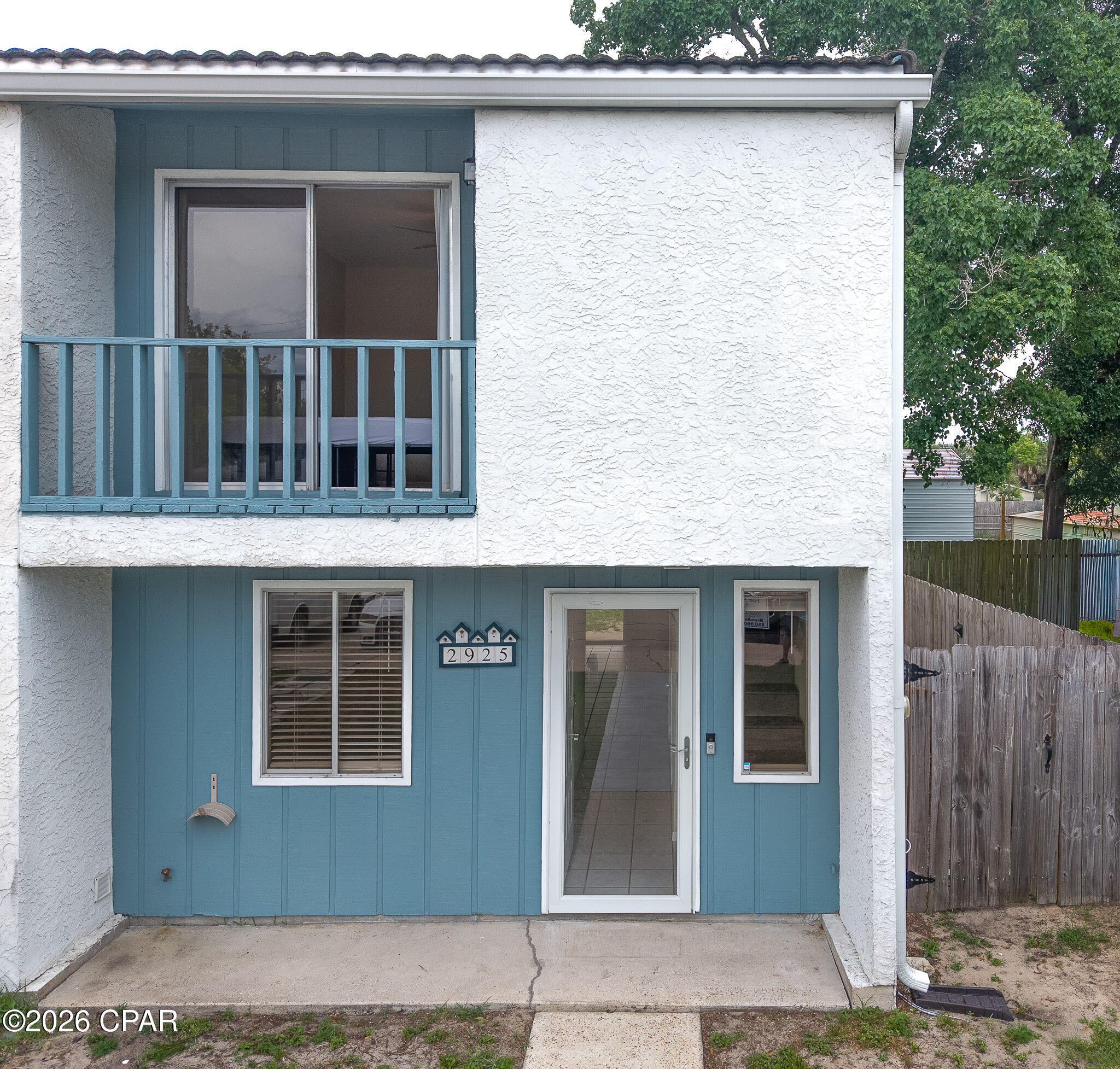 Welcome to 2925 Allison Avenue, a charming 2-bedroom, 1.5-bath home just minutes from the beach and North Lagoon! This low-maintenance property with no HOA is perfect as a starter home, vacation retreat, or investment property. Less than a half mile from the white sandy beaches and Grand Lagoon, this home offers the best of coastal living. Enjoy easy access to top restaurants like Grand Marlin and Captain Anderson's, as well as shopping at Walmart, Publix, and Winn-Dixie. Nearby attractions include Ripley's Believe It or Not, Cobra Race Track, Wonder Works, Coconut Creek Family Fun Park, Zoo World, Signal Hill Golf Course, and Shipwreck Island Waterpark--all within 5 miles. The lively Lagoon area boasts an active nightlife with live music and waterfront dining. Inside, you'll find a bright and airy living area with sliding glass doors leading to a fully fenced backyard, which offers the option to expand for more outdoor space. A covered patio is perfect for relaxing or with space for lounging or a hot tub, and a large outdoor storage closet provides extra convenience. The sunny kitchen includes a full-size washer and dryer, pantry, and plenty of storage, while a half bath is conveniently located on the first floor. Upstairs, the primary bedroom features a extra large walk-in closet, private balcony, and east-facing sliding glass doors, perfect for catching the sunrise. The spacious second bedroom offers a deep closet and plenty of natural light. This home can be sold furnished or unfurnished, making it a turnkey rental investment or a move-in-ready home. Whether you're looking for a primary residence, vacation home, or rental investment, this property has endless potential, having been successfully used as both a short-term and long-term rental. Don't miss out on this fantastic opportunity--schedule your showing today!