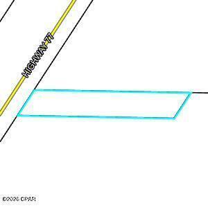 A LITTLE OVER ONE ACRE OF COMMERCIAL LAND WITH 100' FRONTING HWY 77. SELLER OFFERING FINANCING WITH 10% DOWN, 6% INTEREST WITH PAYMENTS BASED ON A 30 YEAR TERM WITH A 7 YEAR BALLOON. BROKER IS RELATED TO THE SELLER.