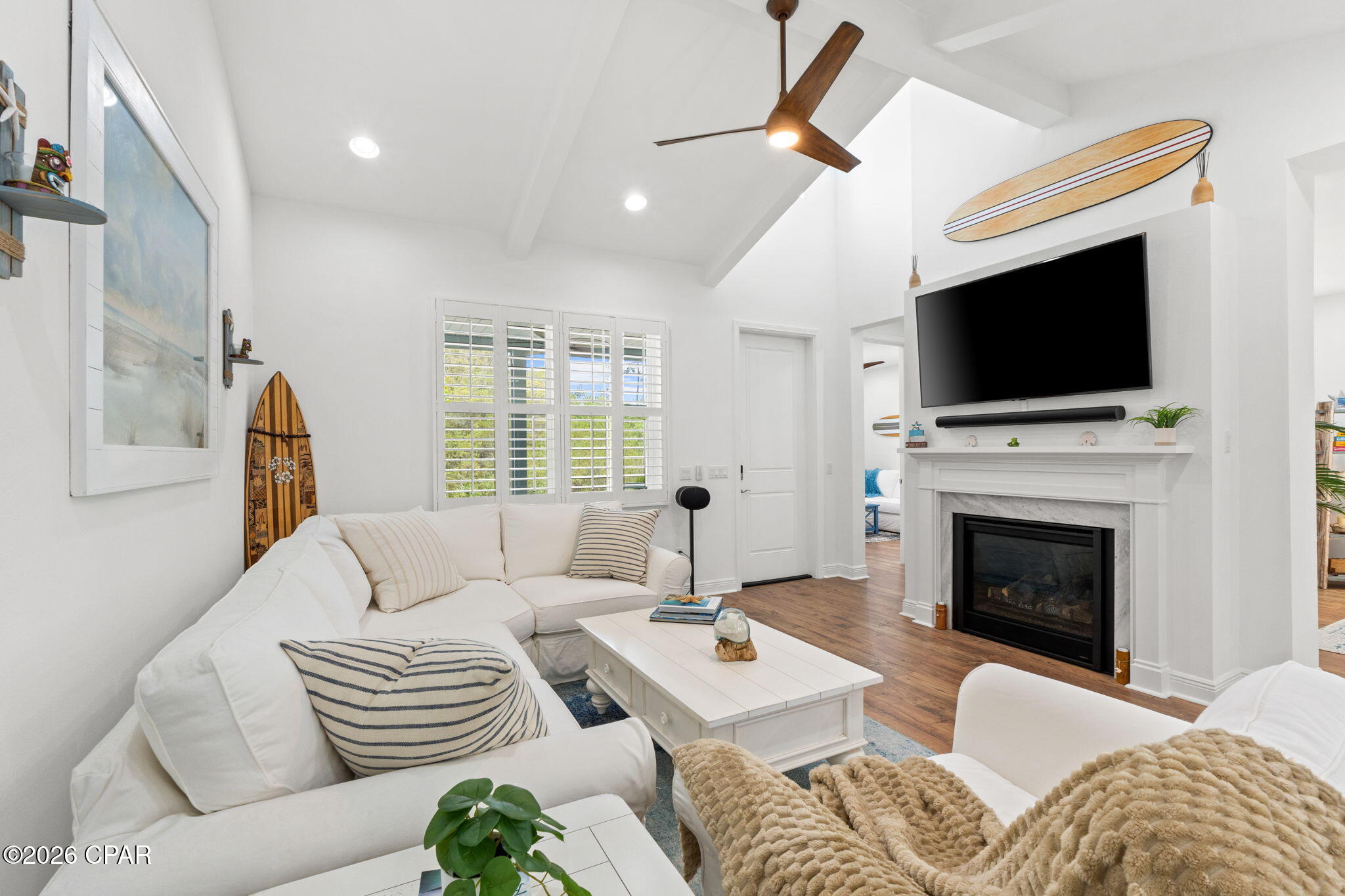 Welcome to your dream coastal retreat in Latitude Margaritaville Watersound! This beautifully upgraded Camellia Cottage is ideally located in highly sought-after Phase 2, just a short walk or golf cart ride to the community's world-class amenities. FULLY FURNISHED (with a few exceptions)! 

Perfectly positioned on a rare preserve-facing lot, this home offers added privacy and serene natural views. Tucked within a quiet enclave on a charming cottage ''island,'' you'll enjoy peaceful surroundings with close proximity to all the action.

Step inside to an inviting open-concept floorplan featuring a spacious family room with vaulted ceilings, decorative beams, and a cozy fireplace--perfect for relaxing or entertaining. The home showcases laminate flooring throughout the main living areas and tile in both bathrooms, combining style and durability.

The gourmet kitchen is a true standout with upgraded 42'' cabinetry, quartz countertops, tile backsplash, large island, and a dedicated coffee bar area--ideal for morning routines or hosting guests. The adjoining dining space flows seamlessly, creating a warm and functional gathering area.

The primary suite offers a tranquil retreat with a luxuriously upgraded en-suite bath, featuring a frameless glass tile shower and dual vanities. A secondary bedroom and full bath provide comfortable accommodations for guests.

This home is being offered mostly FURNISHED (with a few exclusions) and features high-quality pieces from Pottery Barn, Ethan Allen, and Shore House, along with upgraded lighting and ceiling fans throughout, making it truly move-in ready.

Home has a 10 year structural warranty from the original build date and roof/exterior paint replacement on a maintenance schedule is included in HOA dues. Making for an easy, carefree lifestyle! 

Living in Latitude Margaritaville Watersound means enjoying a vibrant 55+ lifestyle with unparalleled amenities, including a resort-style pool, indoor lap pool, state-of-the-art fitness center, pickleball and tennis courts, a full-service restaurant and bar, live entertainment, walking and biking trails, dog parks, and a private beach shuttle. The community is also conveniently located near the Intracoastal Waterway, with future plans for a marina, shopping, and dining, plus a new hospital just minutes away.

Don't miss this opportunity to own a beautifully appointed home in one of the most desirable locations within this award-winning community!

Will consider selling partially furnished or unfurnished if desired. Grass front and back is in process of being replaced.