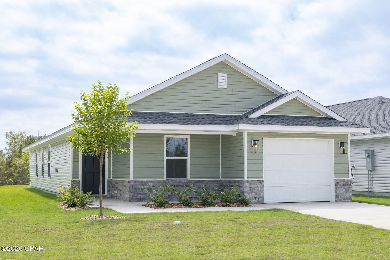 **Price reduction!!! Come check out this brand-new construction, 1,602 square footage home. This enhancing floor plan features cortec pro plus flooring in formal and wet areas, granite countertops, and a slopped ceiling in the living area giving the area more depth. The master bathroom features a walk-in shower and a garden tub. It is located in the desired Fox Glenn community. This community is located approximately 9 miles from Tyndall Air Forces Base, 22 miles from Mexico Beach, and 22 miles from Panama City Beach. All appliances are included!