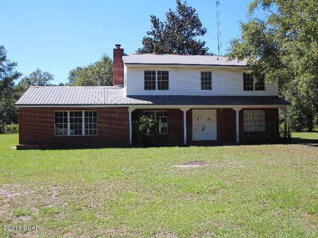 Lovely large two story home on outskirts of Blounstown, FL. Home features large living room with fireplace, large kitchen, large dining room/den and 4 bedrooms and 2 and 1/2 baths. There is a large barn type building and an in-ground pool that needs attention. The home needs some interior finishing but will make a great home for the growing family. It has a 2 car attached garage. It is situated on 2 acres of land!