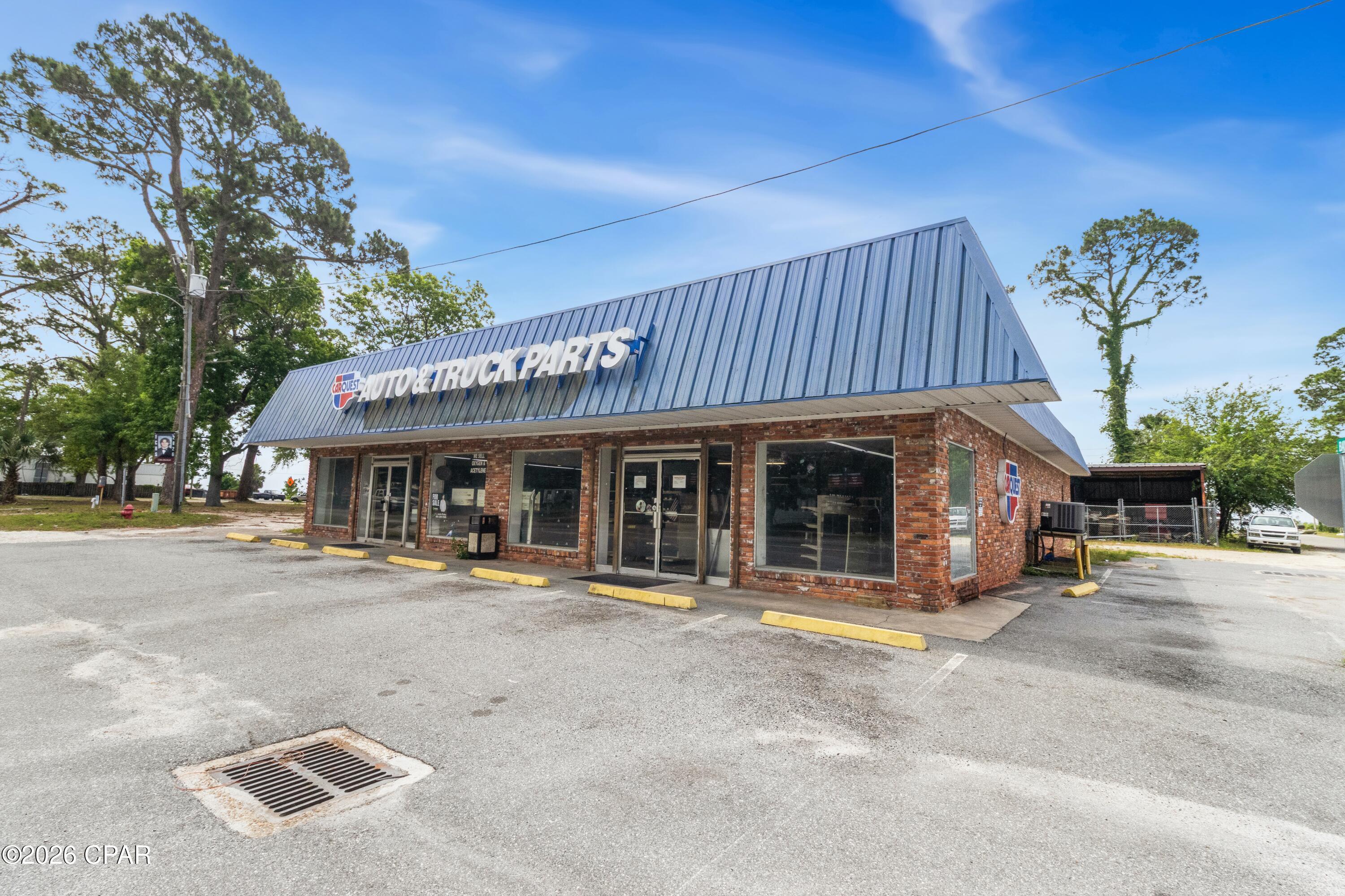This is a rare opportunity to own a free-standing retail building with high-visibility along Highway 98, in East Point Florida. This East Point retail site offers a wide array of potential use cases. Formerly an Auto Parts store, this property is now available to bring your business idea to life.

With all buildings totaling over 7,300 SF under roof, the main retail building is 62x61 of air-conditioned space. The second building is 62x42 fully enclosed space with large roll up doors on each side. There is an additional 22x42 open covered area attached to the second building which is gated and covered.

All measurements and information believed to be accurate. Buyer should verify and measurements or details.

The retail building features large picture windows and two retail entrances, delivering outstanding visibility and an open light-filled interior, perfect for retail, showroom, or service-oriented business. The second building could serve as a perfect storage room, or used as a shop space.

The spacious corner lot offers access from each side with room to drive on each side of the main retail building. Located along Highway 98, this property is less than 150 yards from the Apalachicola Bay. Nearing local seafood restaurants and attractions. Only a few minutes from St George Island, Apalachicola and Carabelle.