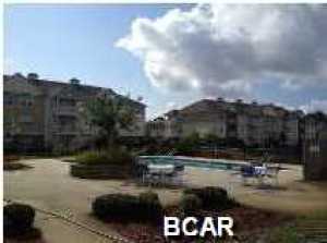 Villas At Suncrest - This is a 2 bedroom, 2 bath flat located in the heart of Panama City Beach. Just minutes form the Navy Base and a short drive to Pier Park. The Villas at Suncrest is a gated community featuring a community pool, club house, gated entrance and most units include a garage. Units all include all utilities except electricity - water, sewer, trash, basic cable, internet and local phone service. Units also feature spacious floor plans with granite counter tops, laminate wood floors, crown molding, upgraded stainless steel appliances, bamboo blinds, jet tub in master bathroom, and balcony over looking the pool. This is a split bedroom plans wit washer and dryer hook ups.
