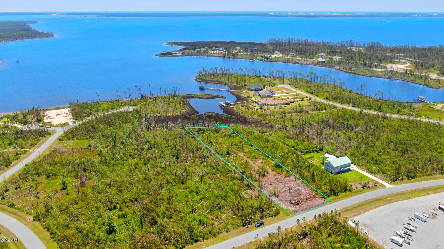 Beautiful and ready for you to build your dream home! This waterfront lot in the gated community of Laird Bayou is one you don't want to miss out on! Flood insurance is not required! Laird Bayou boasts a peaceful, scenic, natural environment with deep water access to East Bay and the Gulf of Mexico from the community boat launch as well as a dock, community pool and fenced storage area for boats/RV's. This is one of the largest lots available with 1.4 acres.



If important, please verify all measurements. Call a Realtor today to schedule your private showing!