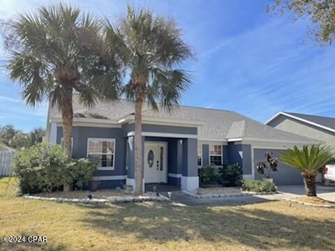 This house is located in the Palmetto Trace subdivision on the west end of the beach.
This 3 bedroom 2 bath updated house includes new floors, new kitchen with new cabinets, quarts counter tops with breakfast bar and stainless steel appliances. Master bedroom features walk in closets. Master bath feathers double vanity and walk in tile shower with glass door.
	Palmetto Trace is golf cart friendly, community pools, minutes from Pier Park and Pier Park North, Frank Brown Park, golf and the Gulf of Mexico! One of the best locations on the beach, stunning home! (Background check required, tenant covers all utilities, deposit is one month of rent, pets negotiable) Come visit today!