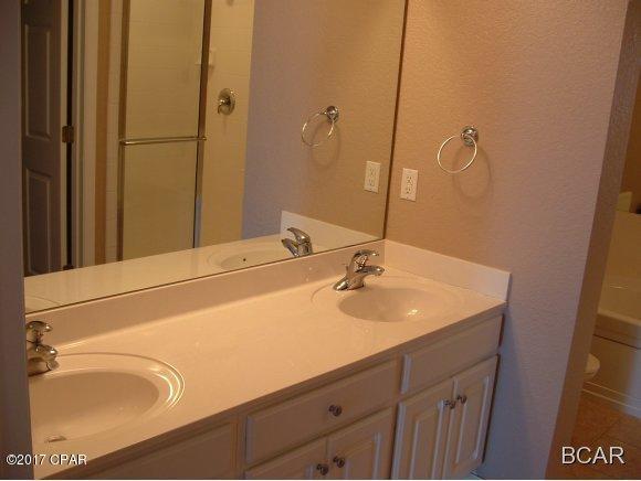 Beautiful waterfront condo in the gated community of Hibiscus by the Bay. The condo comes featuring panoramic views of St. Andrews Bay, granite countertops, laminate flooring, double vanity master bathroom along with walk-in closet, and large balcony. The complex features a fitness room and a community pool. NO PETS ALLOWED. WATER, SEWER, TRASH, BASIC CABLE, AND MONTHLY PEST CONTROL INCLUDED IN RENT!