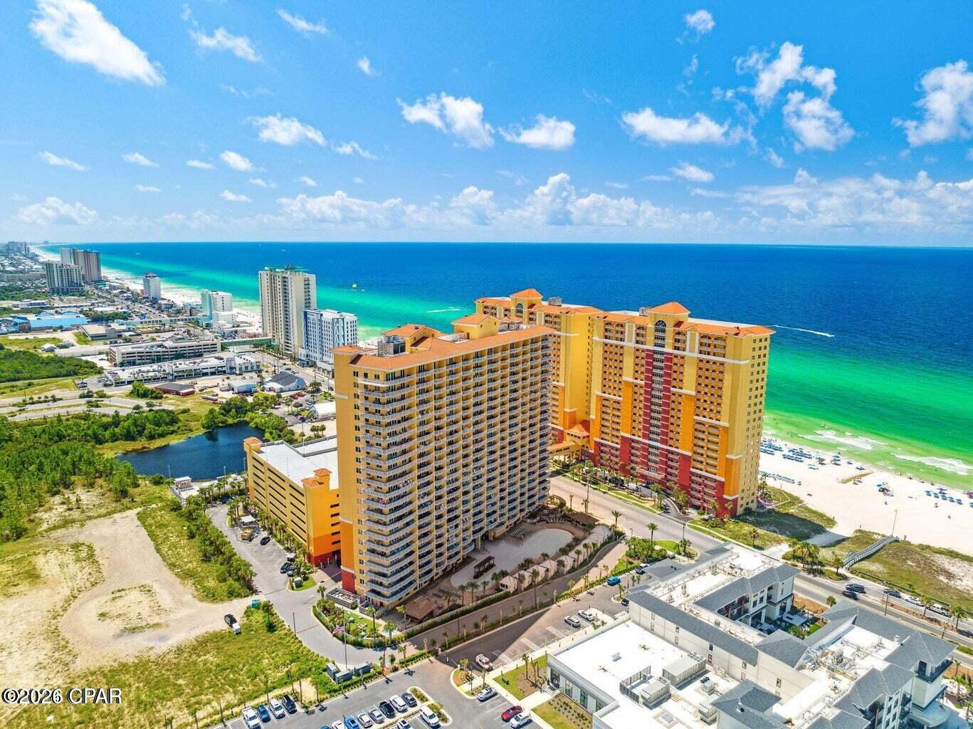 Professional Pictures and Video coming soon!
Welcome to Calypso Tower 3!
Stunning in every way, from its ideal low floor height especially for people with height issue, to its designer interior and extraordinary huge balcony, this unit delivers truly unmatched panoramic views. Enjoy unobstructed vistas of the Gulf, Pier Park, and the dazzling city lights, all complemented by breathtaking sunsets.
Located in Panama City Beach, a destination now gaining national recognition as it evolves from its former spring break reputation into a premier family-friendly luxury market, this property places you at the center of it all.
Welcome to a rare coastal oasis featuring one of the most exclusive floor plans in the building. This is the only 3-bedroom, 3-bath end unit per floor, with just 22 units of this kind in the entire tower-making it truly one of a kind. Whether you're seeking a private retreat or a high-performing vacation rental, this residence offers exceptional versatility.
Spanning approximately 2,117 square feet, this unit is highlighted by an expansive 609-square-foot wraparound balcony-perfect for entertaining or simply taking in sweeping views from every angle. The Gulf-front primary suite offers a luxurious escape, complete with a spa-inspired bathroom featuring a large walk-in shower with dual shower heads.
From day to night, enjoy spectacular scenery including the illuminated Pier Park, the iconic Ferris wheel, and seasonal fireworks displays (weather permitting),
all from the comfort of your private balcony.
Professionally furnished and thoughtfully upgraded throughout, this unit is more than just a condo-it's a statement of refined beachfront living. From the moment you enter, the quality and attention to detail are undeniable.
Enjoy an impressive collection of resort-style amenities, including a lagoon-style pool, hot tub, well-appointed fitness center, on-site dining with al fresco seating, and direct beach access-offering a true luxury lifestyle just steps from the sand.
Don't miss this rare opportunity to own one of the most distinctive and sought-after units in Panama City Beach. Schedule your private showing today and experience elevated coastal living at its finest.