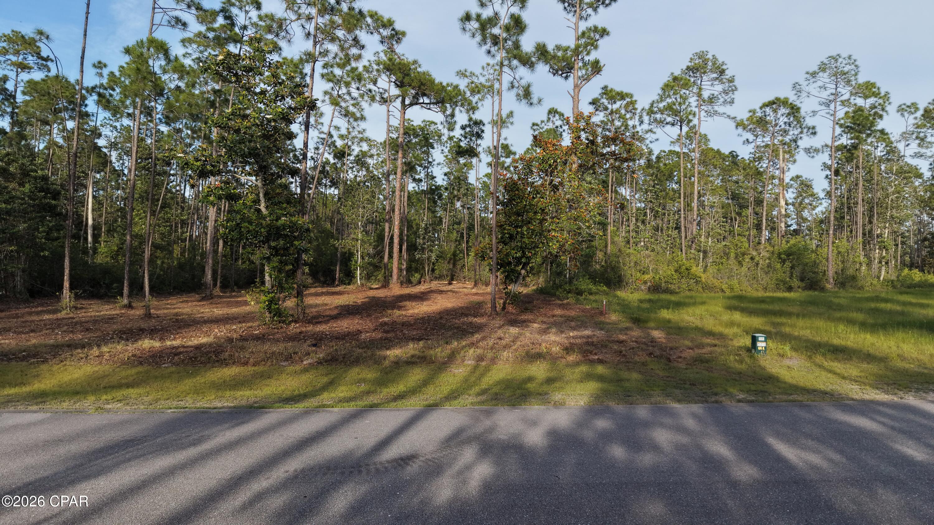 Build your dream home in the highly sought-after Laird Point! This beautiful homesite sits on the west side of the peninsula, perfectly positioned to enjoy the cool breezes from East Bay. With water, sewer, and electric ready to connect, you're one step closer to bringing your vision to life.

Just a short distance to the tennis courts, this gated waterfront community offers the lifestyle buyers are looking for--complete with underground utilities, RV and boat storage, and surrounded by stunning custom homes.

Opportunities like this don't last--come experience Laird Point for yourself and schedule your visit today!
