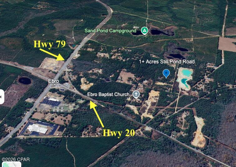OWNER FINANCING WITH $7,000 down.   7.5% interest (Interest-only) with a 5 year balloon.  PAYMENTS ONLY $205.63/mo.      Large 1+ acre lot in Ebro.   Close to the intersection of Hwy 79 and Hwy 20.  Trailer and Shed currently on the property are of no value.  Please do not enter the trailer or the shed.