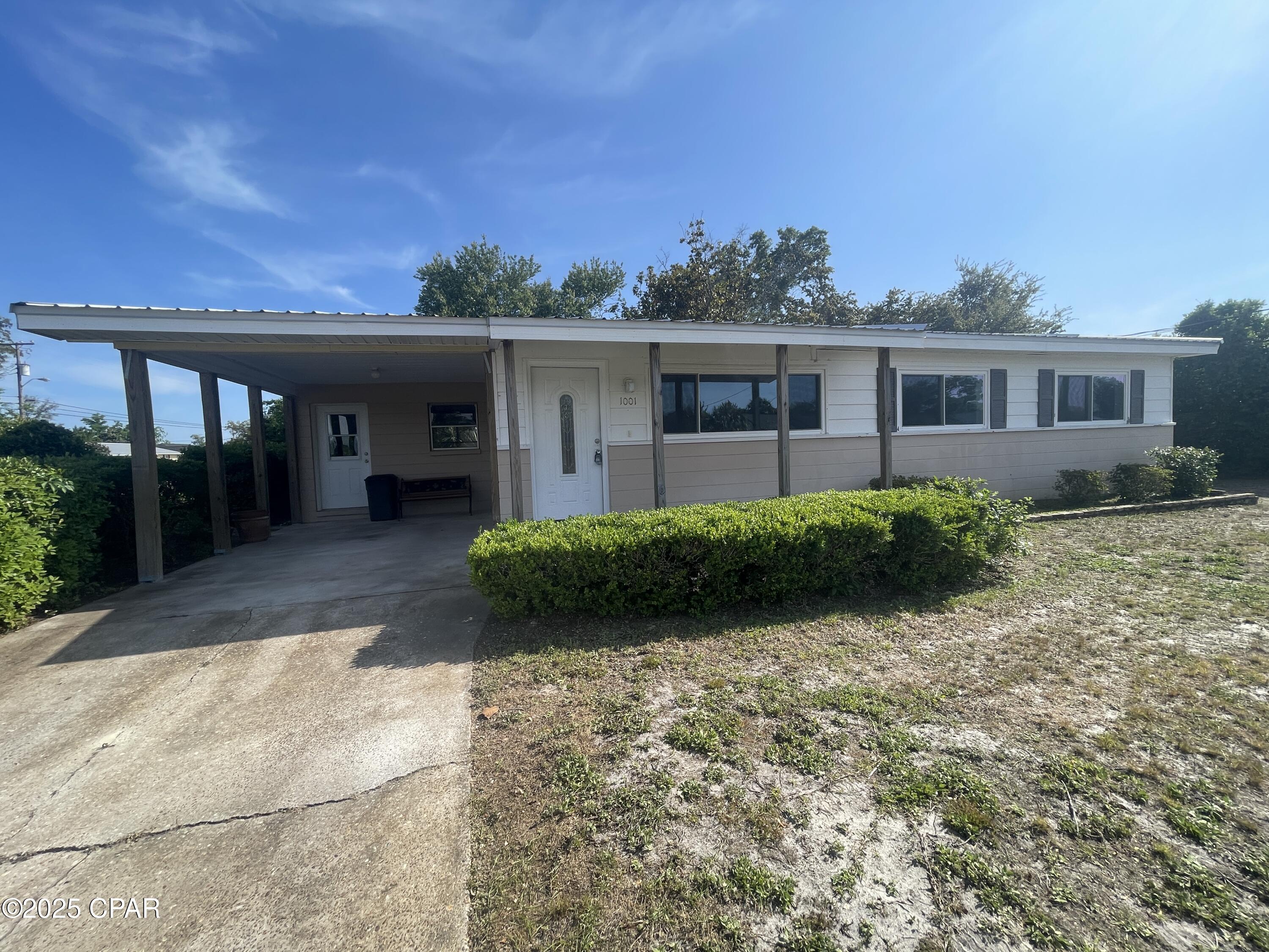 For Lease - Beautifully updated 3 BR, 2 BA home situated on a huge corner lot in the heart of Panama City! The home offers luxury vinyl plank flooring throughout with a large living room area and bonus room for media/home office/dining. The kitchen overlooks the main living room and opens up to the dining area. It features recent updates including stainless appliances and shaker cabinets. The master bedroom has patio access to the large, screened enclosure, and an attached master bathroom with a newly installed tile tub/shower. Two additional bedrooms with hallway bath; Beautiful back yard with shade trees and plenty of room for the kids to play! Large laundry & mud room with access door from the covered carport. **Pets are negotiable upon approval with a $250 pet deposit, $50 pet fee, $25 monthly pet rent/pet.