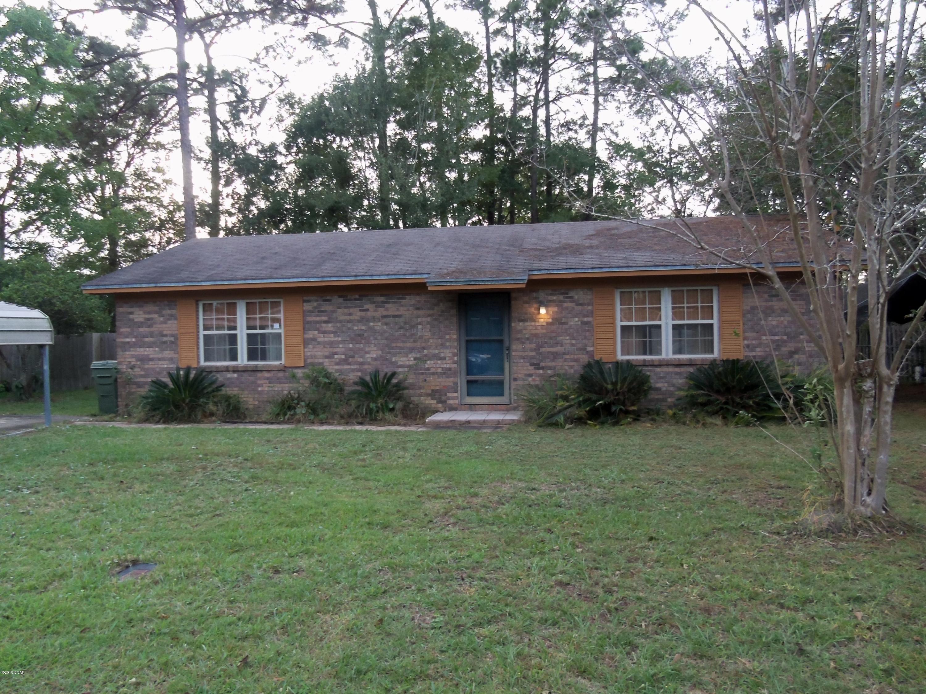 Lynn Haven Charmer! Great all brick home in awesome Lynn Haven location. This 2 bedroom, 1 bath home features an open floor plan, upgraded lighting, large bedrooms, lots of interior storage, and a super sized finished shed out back that was previously used as a rec room. Really nice additional living space. Large covered patio and screened porch on the back of the house. Deck walkway with solar lighting from the house to the shed. Gates on both sides and at rear alley. Storage building features wall unit AC, flat screen TV (mounted) and a large storage area that runs the length of the building. (all sizes approximate and taken from public records, buyer to verify any details buyer deems important)