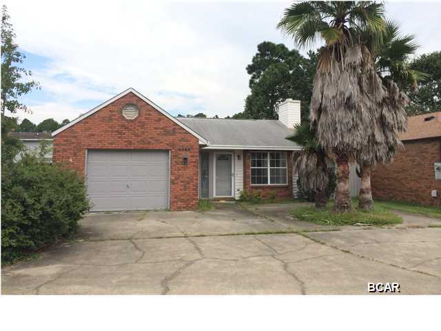Attractive patio home in the Northshore area! This home features a spacious living room with a fireplace, an eat-in kitchen, Master bedroom with walk-in closet, and a patio door to the backyard with an in-ground pool. There is an enclosed Florida room off the living area that also overlooks the pool. Home is being sold in its AS IS condition. Buyer/Agent to verify all measurements, and information provided.