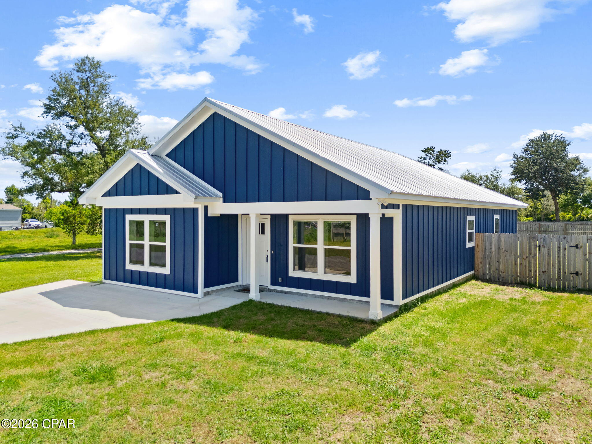 Qualified buyers may receive up to $10,000 in seller concessions to be applied toward closing costs, prepaid expenses, and other allowable lender-approved costs with an acceptable offer. 
Completed in 2025, this attractive 4-bedroom, 2-bath home offers approximately 1,745 square feet of living area in the Parker area of Bay County. Built using Structural Concrete Insulated Panels (SCIP/ICF construction), the home is designed for strength, durability, energy efficiency, and a quieter interior environment than traditional wood-frame construction.    
 The thoughtfully designed floor plan features an open living, dining, and kitchen area, creating a comfortable space for both everyday living and entertaining. The kitchen is finished with granite countertops, an island, pantry, and luxury vinyl plank flooring that continues throughout the home. The master bedroom suite  (one of four bedrooms) includes a walk-in closet, double vanity, and separate shower, while a fourth bedroom provides flexibility for guests, a home office, or multigenerational living.    
 Outside, the fully fenced backyard offers ample room for recreation, gardening, or pets. The home is conveniently located near schools, shopping, and major transportation routes. Additional features include public water and sewer, central electric heating and cooling, metal roofing, and a concrete driveway with parking for multiple vehicles.    
 Overall, the property combines the benefits of nearly new construction, low-maintenance finishes, and innovative insulated concrete construction, making it an appealing option for buyers seeking a durable, energy-conscious home with modern amenities.