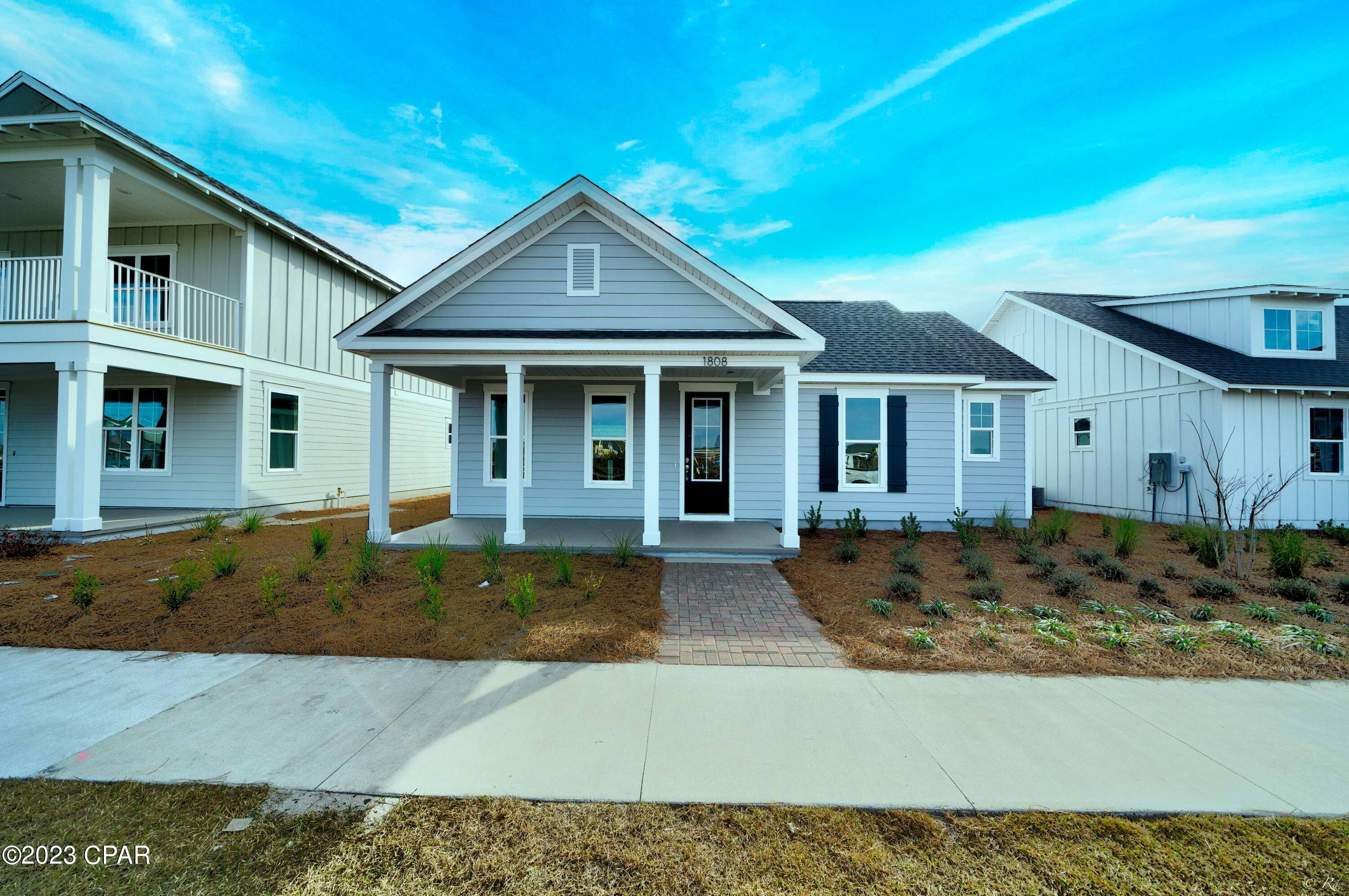 Quick Closing! Ask about builder incentives! This popular St. Andrew plan by Harris Doyle Homes in waterfront SweetBay! This plan is an expansive one-story home with a stunning open floor plan and rear attached 2-car garage. Standard features include window trim and crown mounding, 8' doors, tile-to-ceiling shower in the primary bath and vaulted ceiling in the large great room. SweetBay is a walkable community with unrivaled amenities: dock with North Bay access for kayaking, paddle boarding, and fishing, parks, junior olympic pool, basketball and sports court, miles of trails, and planned future amenities including a town center and marina! New home buyers even get priority access to top-rated University Academy!
