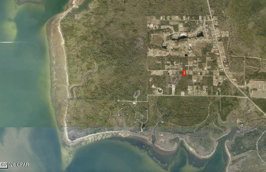 *Build Your Vision in a Peaceful Setting* NO HOA ... Discover the freedom to design your dream home on this residential-zoned parcel--spanning over an acre of tranquil Florida land just off East Bay. Tucked away on Cue Drive, this property offers the perfect blend of privacy and potential, with easy access. Whether you're planning a custom build, a weekend retreat, or an investment for the future, this spacious lot invites creativity and offers opportunity. With room for a well and septic installation, you can shape your own self-sufficient lifestyle minutes from Panama City's conveniences, coastal attractions, and beautiful beaches.