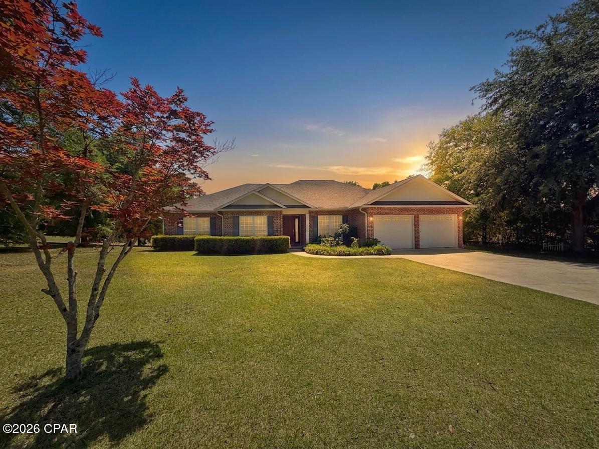 Discover comfort, space, and convenience in this beautifully maintained 4-bedroom, 2.5-bath home nestled in a sought-after established neighborhood in Marianna, FL. Built in 2009 and move-in ready, this property offers a perfect blend of classic style and modern livability.

Step inside to find bright, open sight lines and timeless white cabinetry that create an inviting atmosphere ideal for both everyday living and entertaining. The thoughtfully designed split-bedroom floor plan provides privacy, with a spacious primary suite featuring elegant French doors that open to a covered back patio--perfect for morning coffee or relaxing evenings. The ensuite bath is a true retreat, complete with two walk-in closets, a soaking tub, and a separate shower.

Situated on nearly an acre, the outdoor space is just as impressive. Enjoy mature landscaping, a storage shed for added convenience, and even a robotic lawn mower to keep your yard looking pristine with minimal effort.

Additional highlights include a double car garage and a prime location just minutes from local schools, Florida Caverns State Park, the Mere Sports Complex, and charming downtown Marianna.

This home offers the space you want, the features you need, and the location you'll love--schedule your showing today!