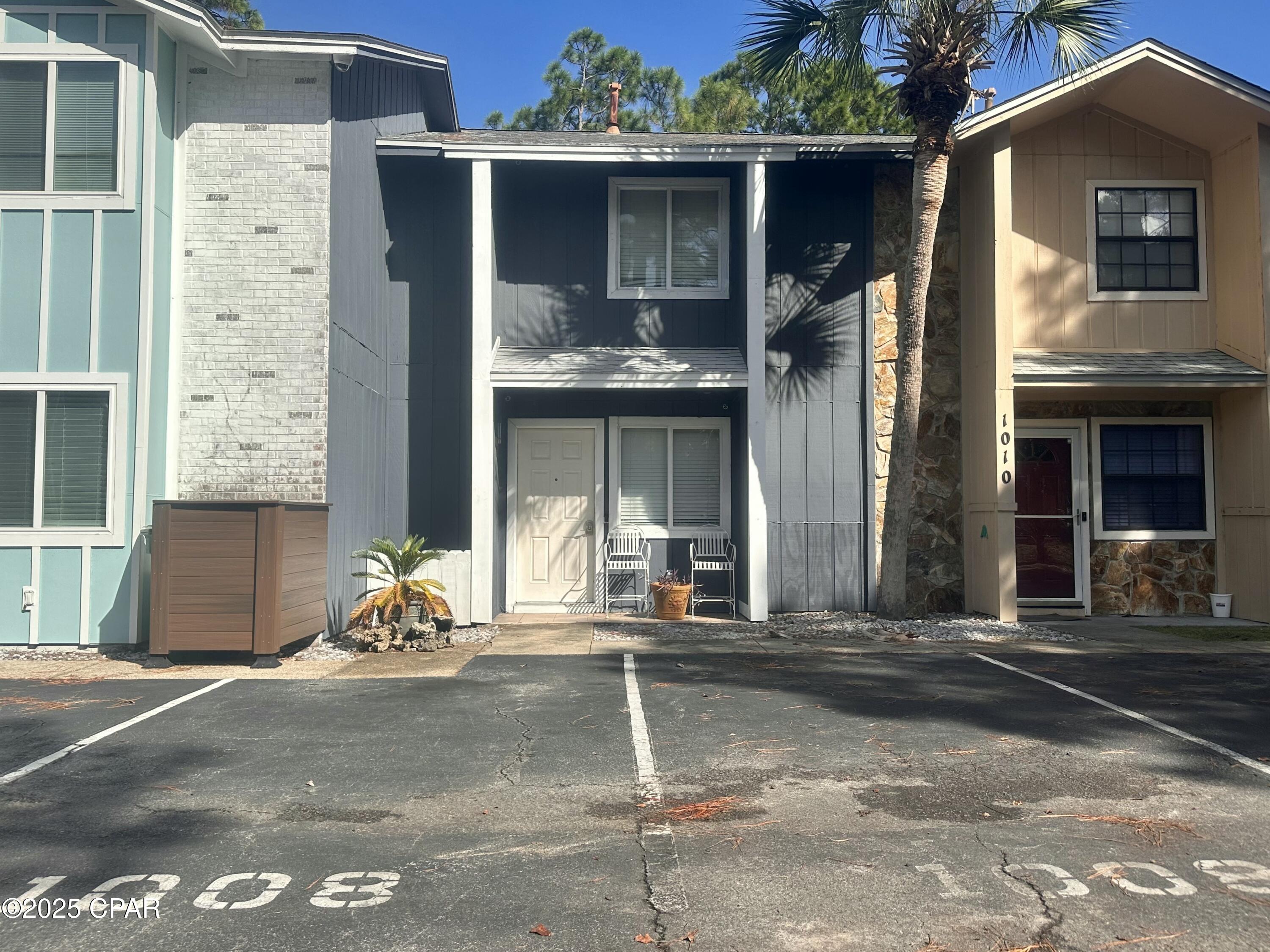 Beautifully maintained 2-bedroom, 2.5-bath townhome located in the highly desirable Harbour Towne community, perfectly positioned on the picturesque lake! Enjoy the best of both worlds with a prime location just off Highway 98 and Thomas Drive--conveniently close to the beach and town, shopping, dining, entertainment and everything Panama City Beach has to offer. This home features a new A/C (2020), a newer roof (2019), fresh carpet upstairs and modern tile downstairs and in all bathrooms. The spacious master suite includes a private balcony with tranquil lake views, ideal for relaxing with your morning coffee. The second bedroom and full bath upstairs provide plenty of room for family or guests. Newer washer and dryer come with the house! Low HOA fees of only $173.50/month cover trash pickup, basic cable, lawn care, and access to community amenities, including pools, a tennis court, and a clubhouse. Whether you're looking for a primary residence, vacation home, or investment property, this townhome offers exceptional value and location!