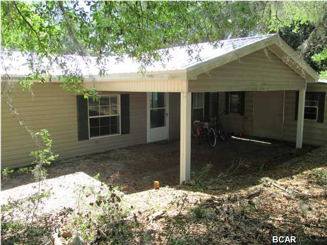 Very well maintained mobile home on just under 6 acres overlooking River Pond Lake. A new metal roof was installed in May, 2015. Bring your horses, canoes, kayaks and beach chairs. This property is ideal for first time home buyers, retirees looking for more privacy or for anyone looking for a great buy in a first or second home. Enjoy the peace of country living while sitting on the large screened porch overlooking the lake. LOOKING FOR MORE PROPERTY OR TWO HOMES?  AN ADDITIONAL HOME AND 6 ACRES ARE AVAILABLE NEXT DOOR - SEE MSL # 640379.  Call your agent today and schedule a visit. Sizes and measurements are approximate. Verify if important.