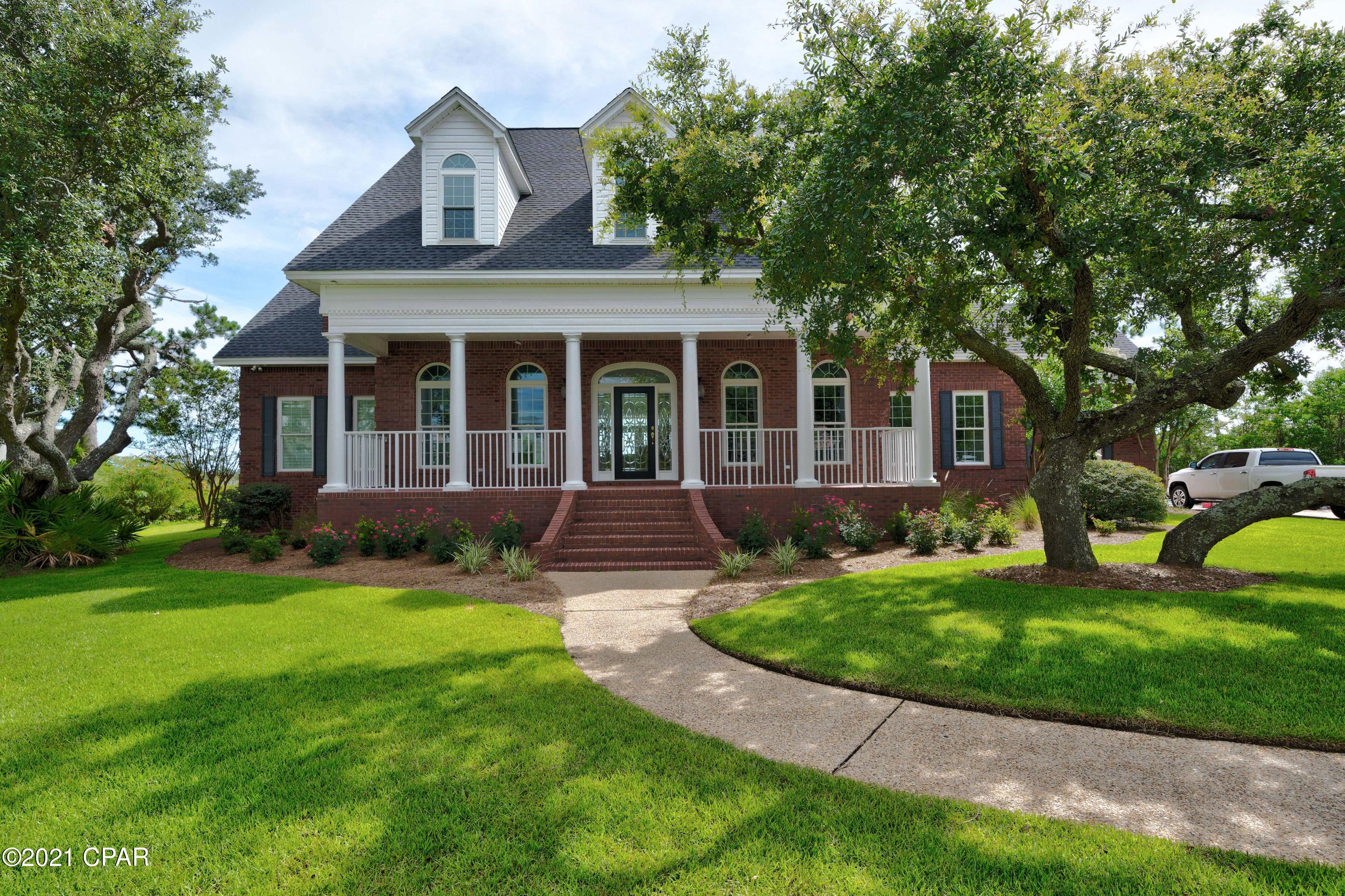 Stunning 2 story brick waterfront home in the highly desirable Northshore  Goose Bayou area.  This 5 bedroom, 5 bath home sits on almost 1 acre, and estimated  128 feet of water frontage . Completely upgraded with an open concept. You are greeted at the entrance with a large foyer, formal dinning room and office. Entering the living room with fireplace, you are surrounded by high ceilings and windows throughout with panoramic views of the Bayou.  New Hickory flooring through out. Kitchen has been completely remodeled with stainless steel appliances, double oven, oversize custom fit fridge, wine cooler, ice maker, wine rack. Double sink and all quartz countertop throughout.  Master bedroom is on the 1st floor with fireplace, views of the Bayou,  custom showers and large his/hers closets. You have a Butlers pantry prior to entering the formal dinning room with custom Hickory wood flooring throughout the home.  Large laundry room with numerous cabinet space.  Heading to the second floor, you have a pristine view of the Bayou and boat dock with lift.  Large Bonus room on the left that can easily be an extra bedroom, game room, TV room etc.  Additional master bedroom on the second floor with full custom bath.  All rooms have views of the Bayou.  The exterior of home includes a newly replastered inground pool with new decking.  Custom patio with ceiling fans and great views of the Bayou.  Boat dock with lift, water supply access, electrical outlet. Great views of Dolphins swimming up to the dock.  You can fish, paddle your kayak and watch the sunset.  Garage is oversize with a full custom bathroom with shower which accommodates exiting the pool.  Home has two tankless water heaters and all of the interior of the home has been completely remodeled from wall to wall and room to room. Lawn Sprinkler system throughout  and additional parking. With shortage of waterfront homes with pool, boatdock, gulf access, 5 bed, 5 bath at 4567 sq ft........ this home is priced to sell and wont last long.