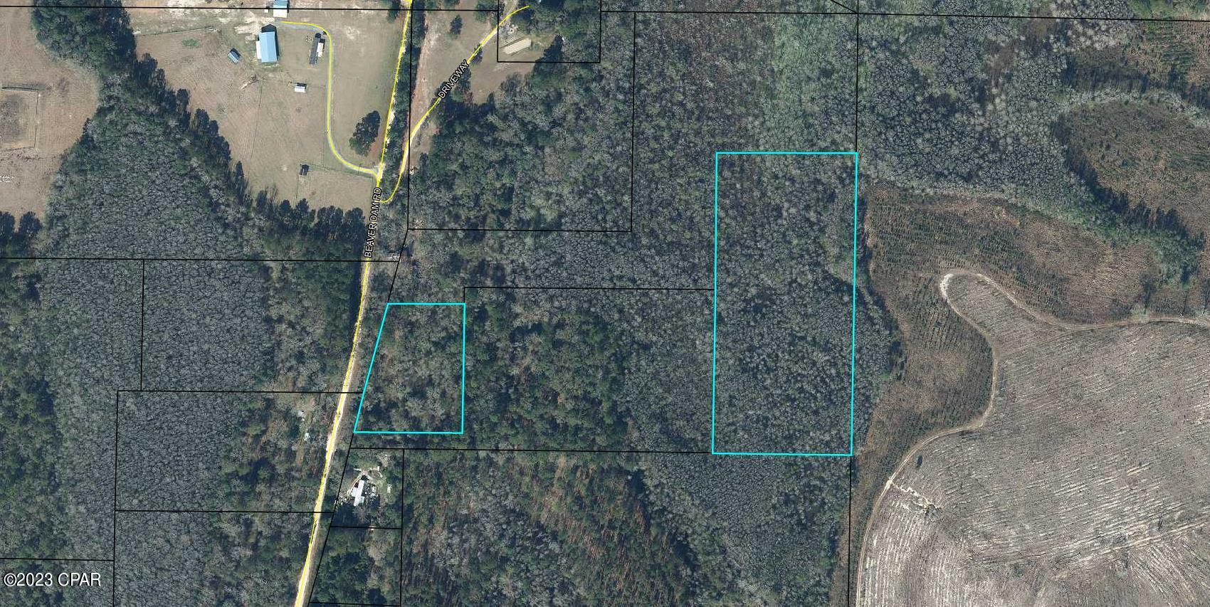10+ Acres with Well and septic. Old mobile home is being removed. Approximately 2 Acre old homesite fronts the road.  The remaining acreage has a deeded easement for access from the road. Mostly wooded. Has shed.  Great spot for a new home with plenty of land to hunt. Lots of wildlife. Located on county maintained dirt road. Short distance to town. Check it out today!!!