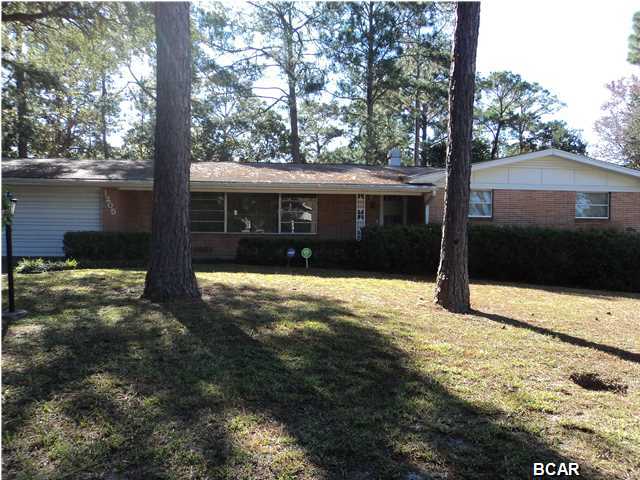 St. Andrews Belle! Welcome home to one of Bay County's most sought after neighborhoods. This lovely home was custom built and has only had one owner. Roomy, well built home sits on just over 1/2 acre in the heart of Panama City and is within walking distance to several parks, schools, St. Andrews Bay and The Bay County Library. AND only minutes to Pier Park and The World's Most Beautiful Beaches! A few cosmetic touches and this lovely Belle will shine again! The main living/formal dining area is a very large 28X14. Eat in kitchen has lot of cabinet space and large window overlooking the shaded back yard. Master bedroom is 18x14 LARGE and has double closet space. Den area just off kitchen with built in shelving and patio doors leading to back deck area. LOTS of storage on this